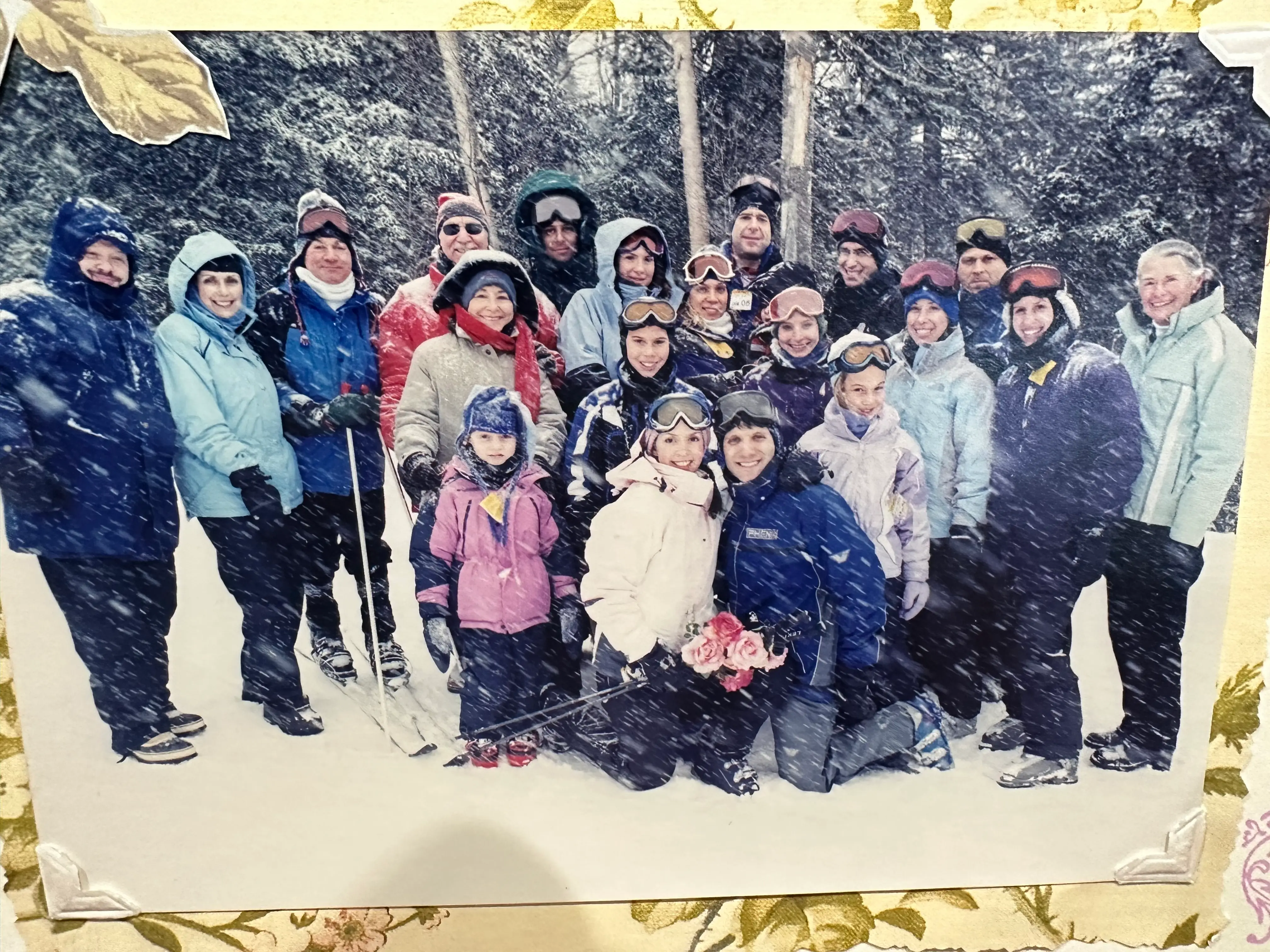 People posing for photo during snowstorm