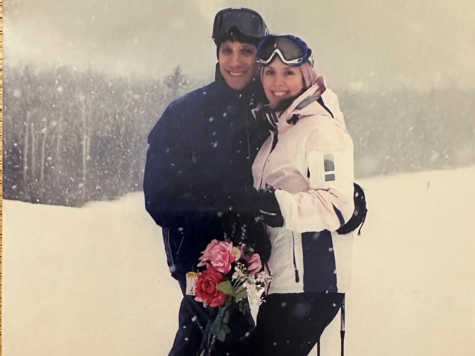 Couple posing in the snow