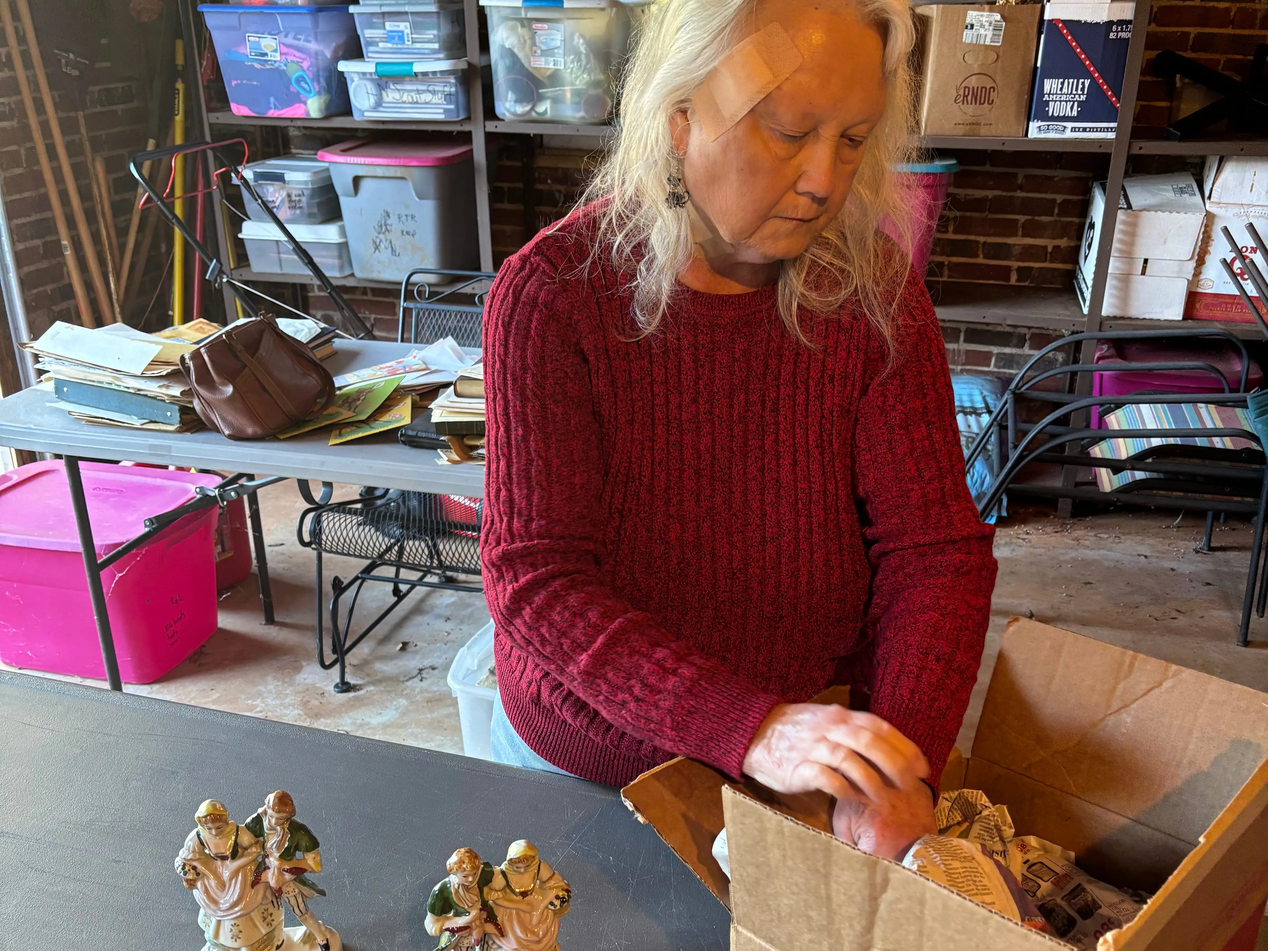 Woman purging boxes