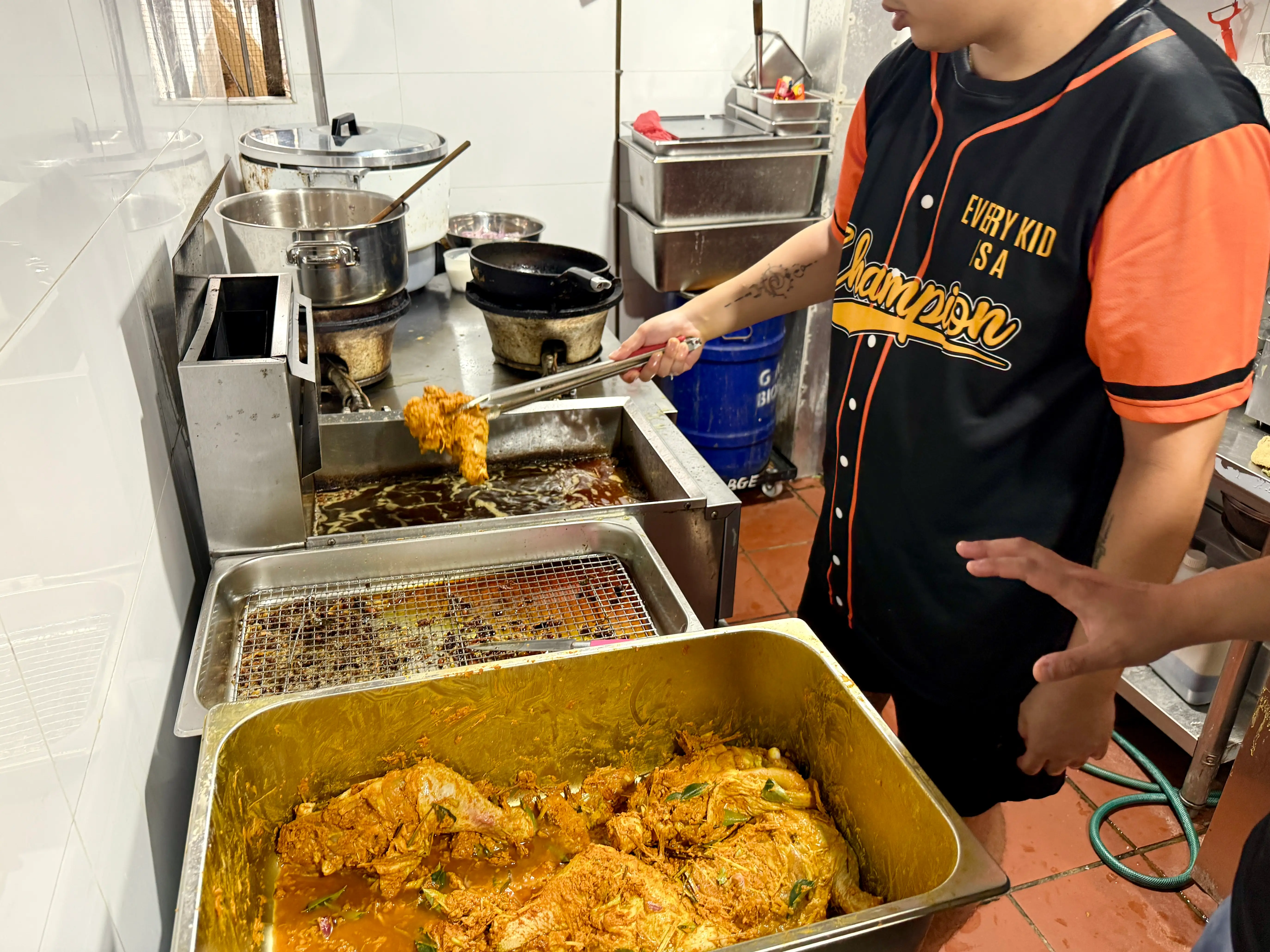 A small kitchen behind the counter is where Koh and his staff cook up the dishes.