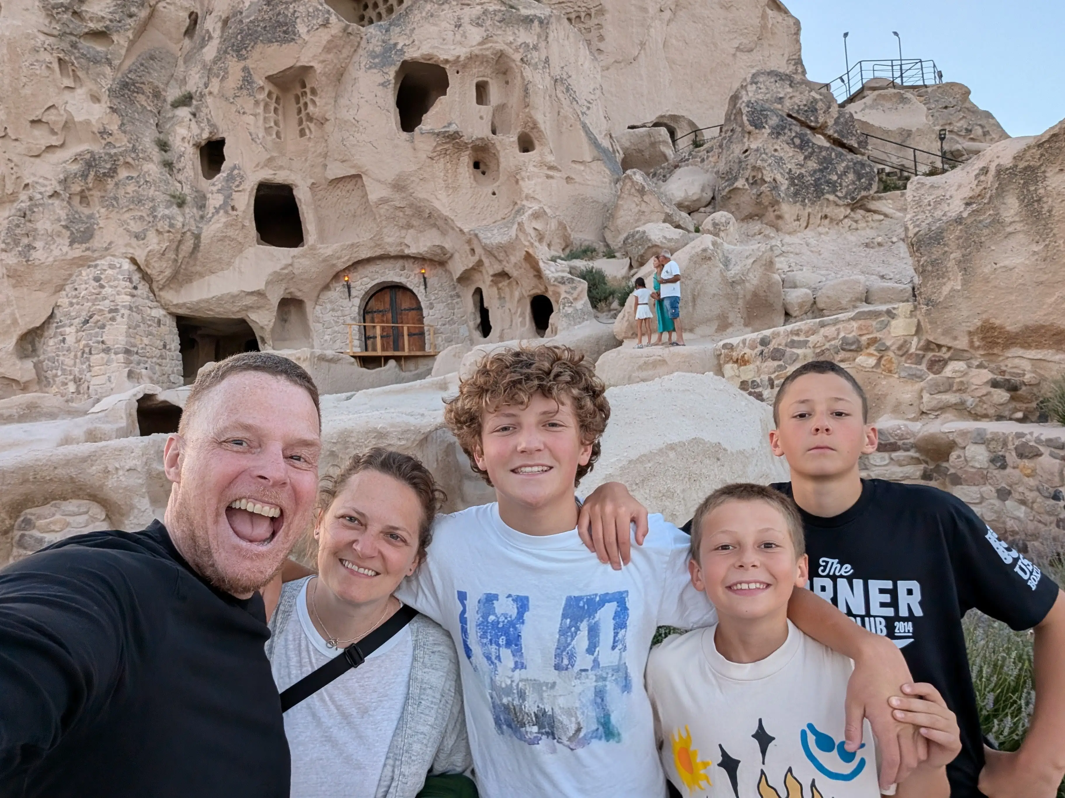 A selfie of a man, a woman, and their three sons in Turkey.