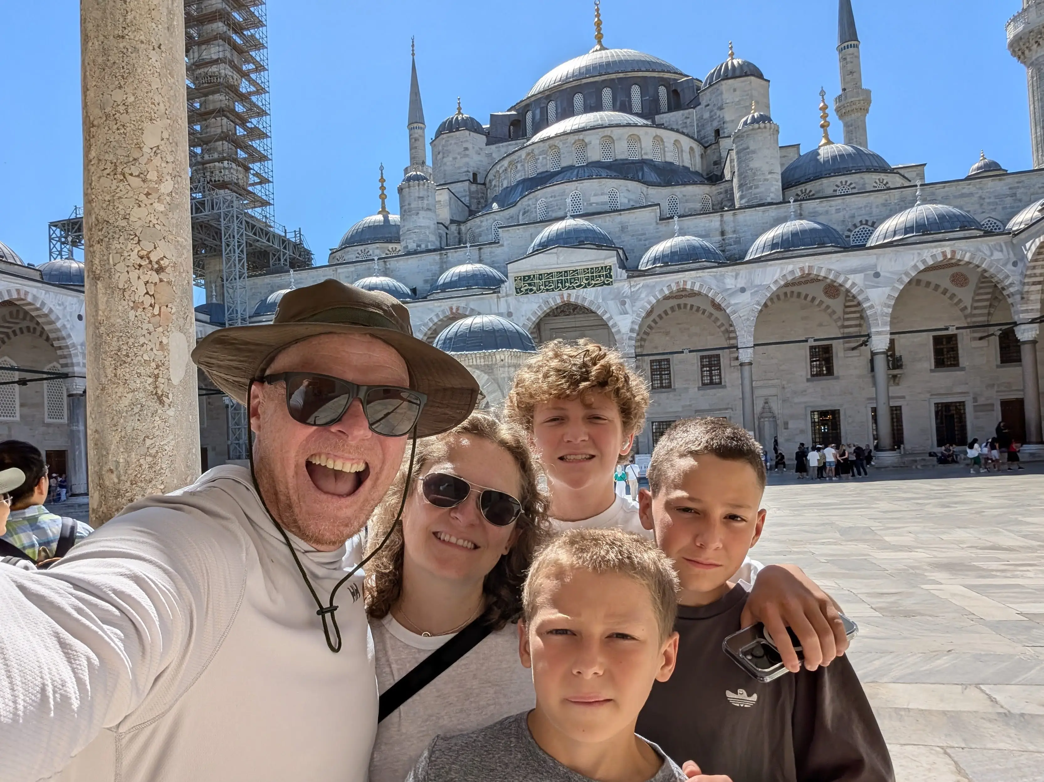 A selfie of a man, a woman, and their three sons in Istanbul, Turkey.