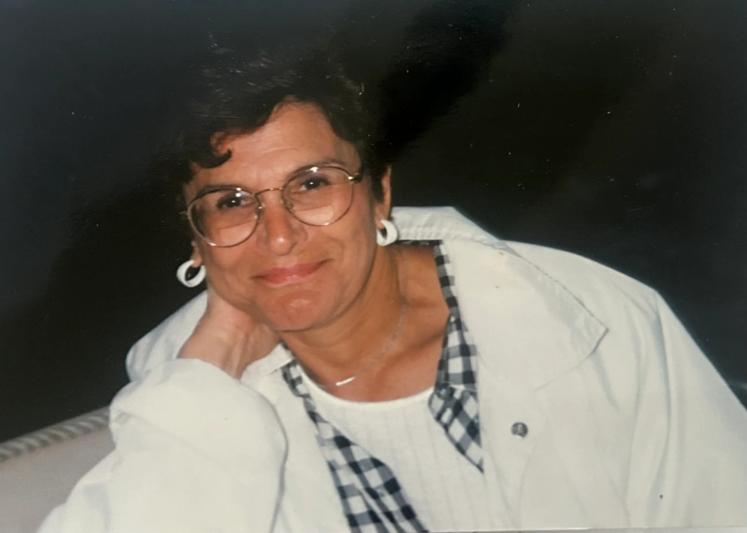 Woman posing for photo in the 80s