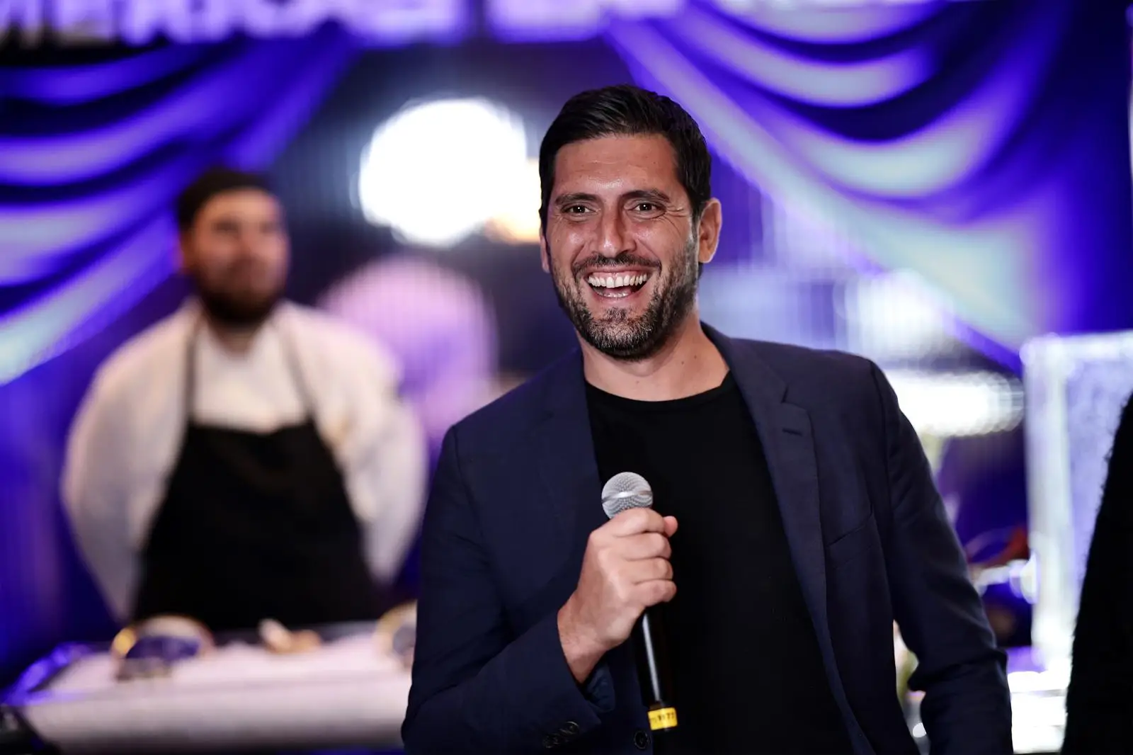 Diego Sabino speaks for The Only Caviar at an event.