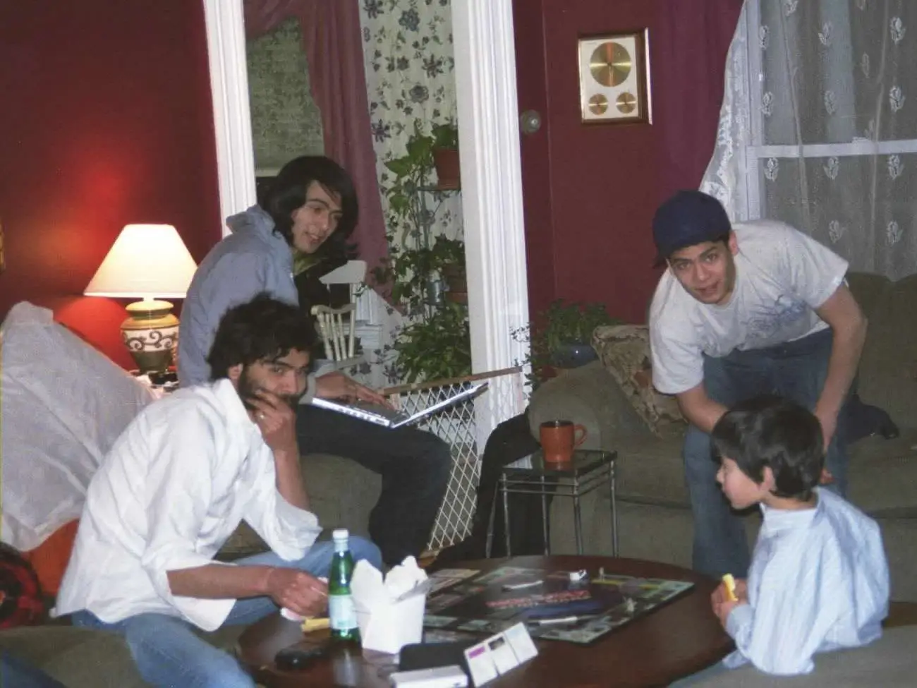 Young men playing monopoly