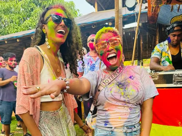 Two women at Holi Festival Celebration Arambol, North Goa, India.