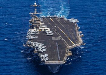 A US aircraft carrier’s hard turn to avoid enemy fire surprised sailors and sent a jet with bad brakes into the sea