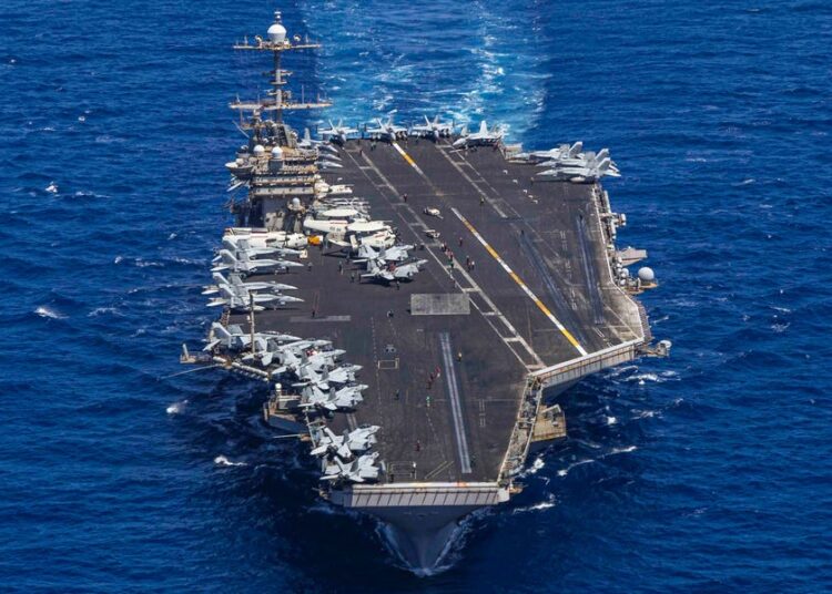 A US aircraft carrier’s hard turn to avoid enemy fire surprised sailors and sent a jet with bad brakes into the sea