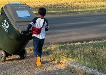 I don’t give my 7-year-old an allowance. Instead, he runs a neighborhood business, where neighbors pay him to take out their trash.