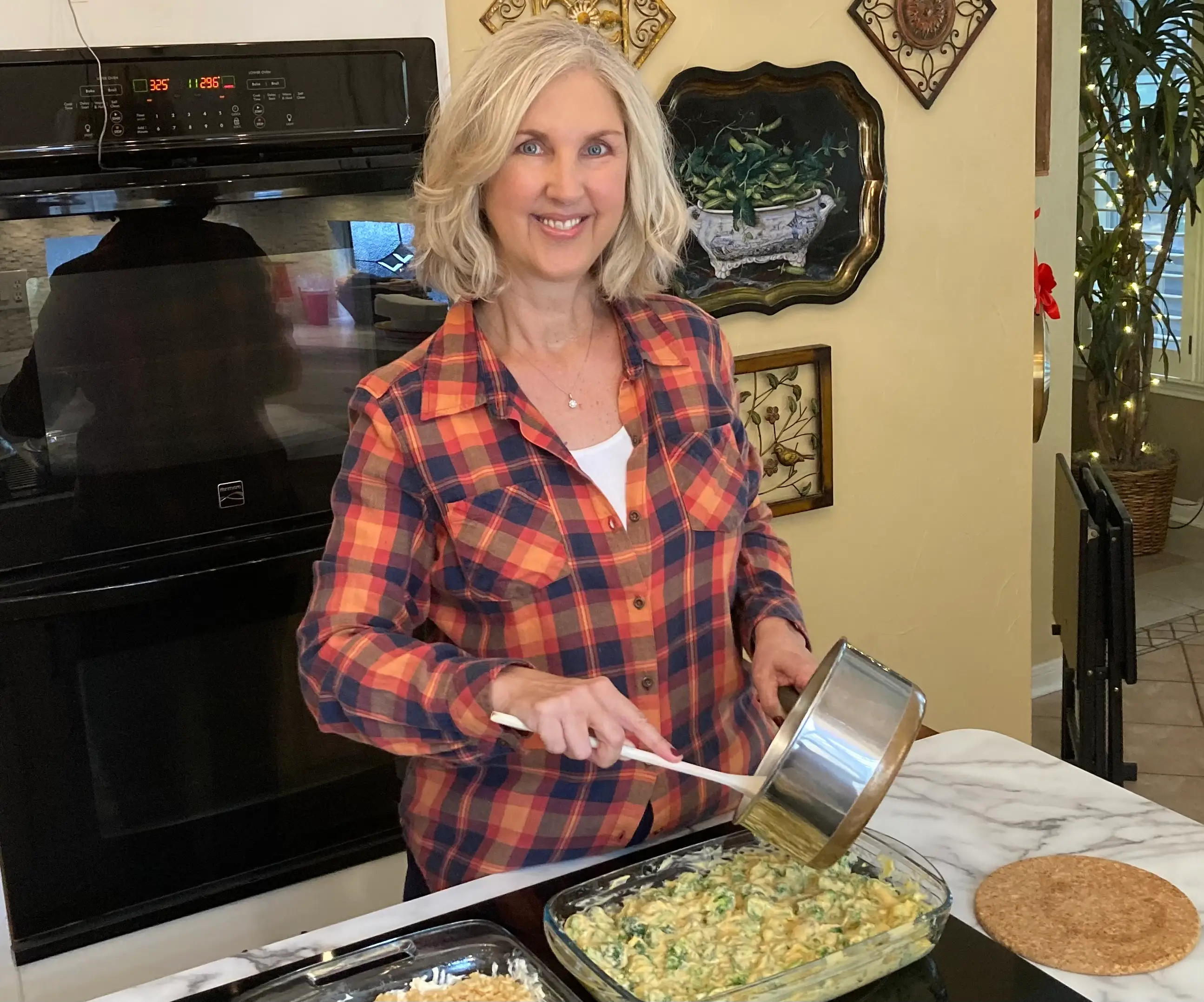 Woman making broccoli casserole