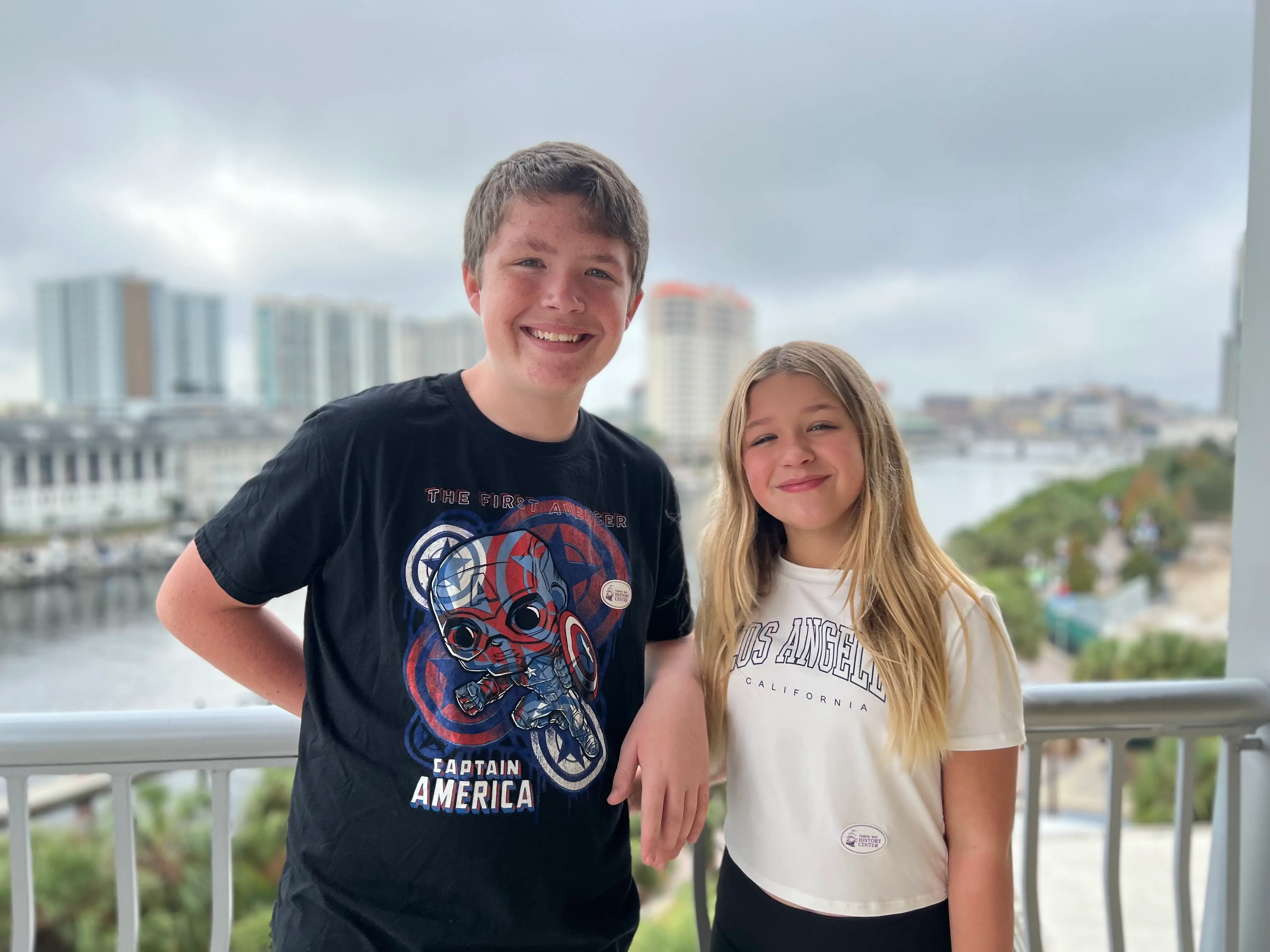 The author's two kids standing on a balcony.
