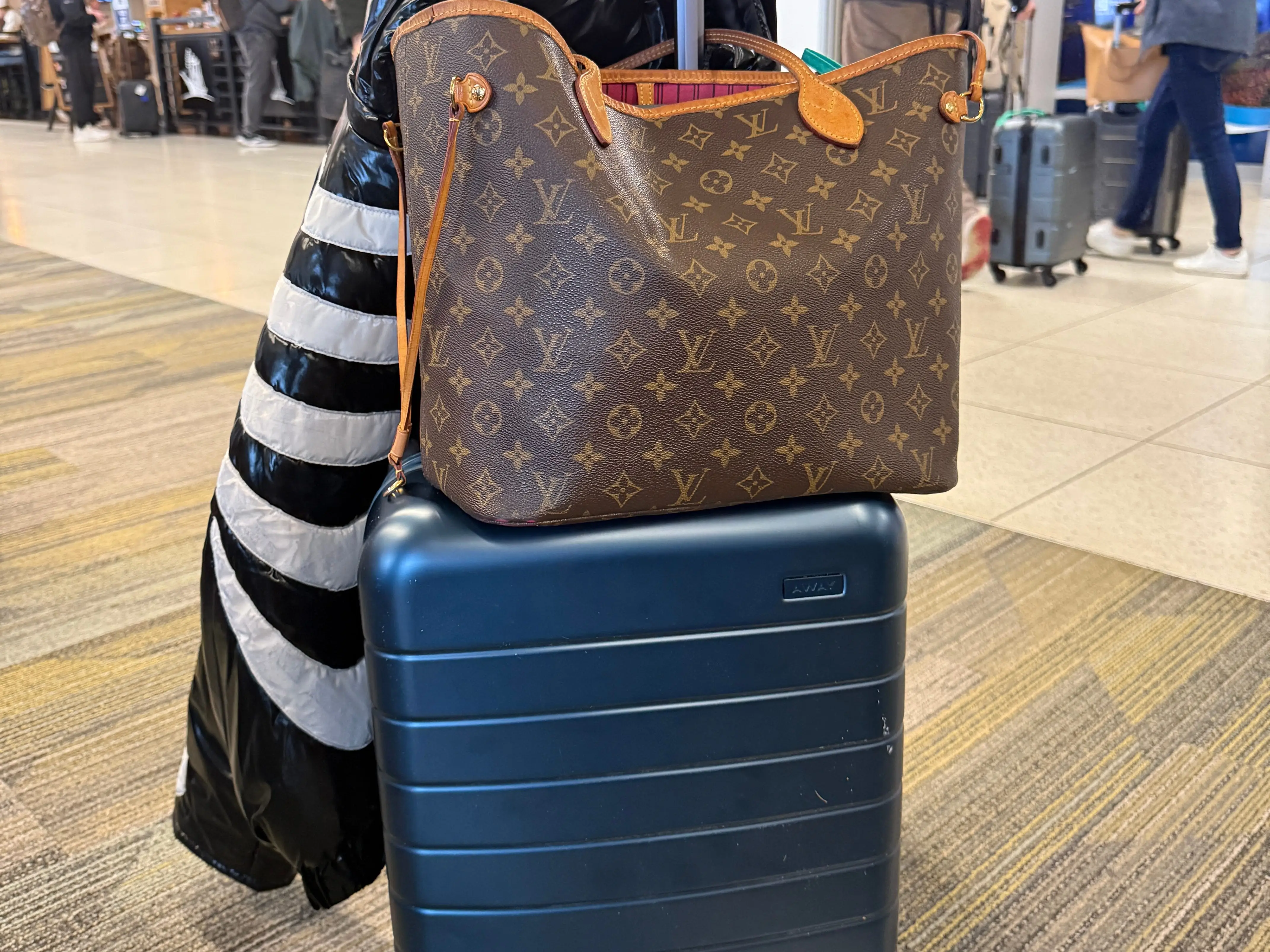 Away suitcase in airport