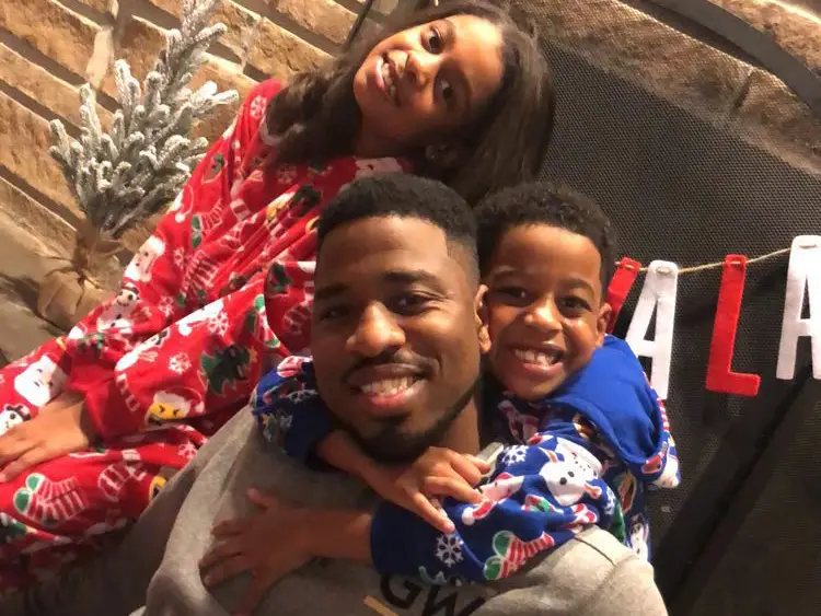 Family posing for photo