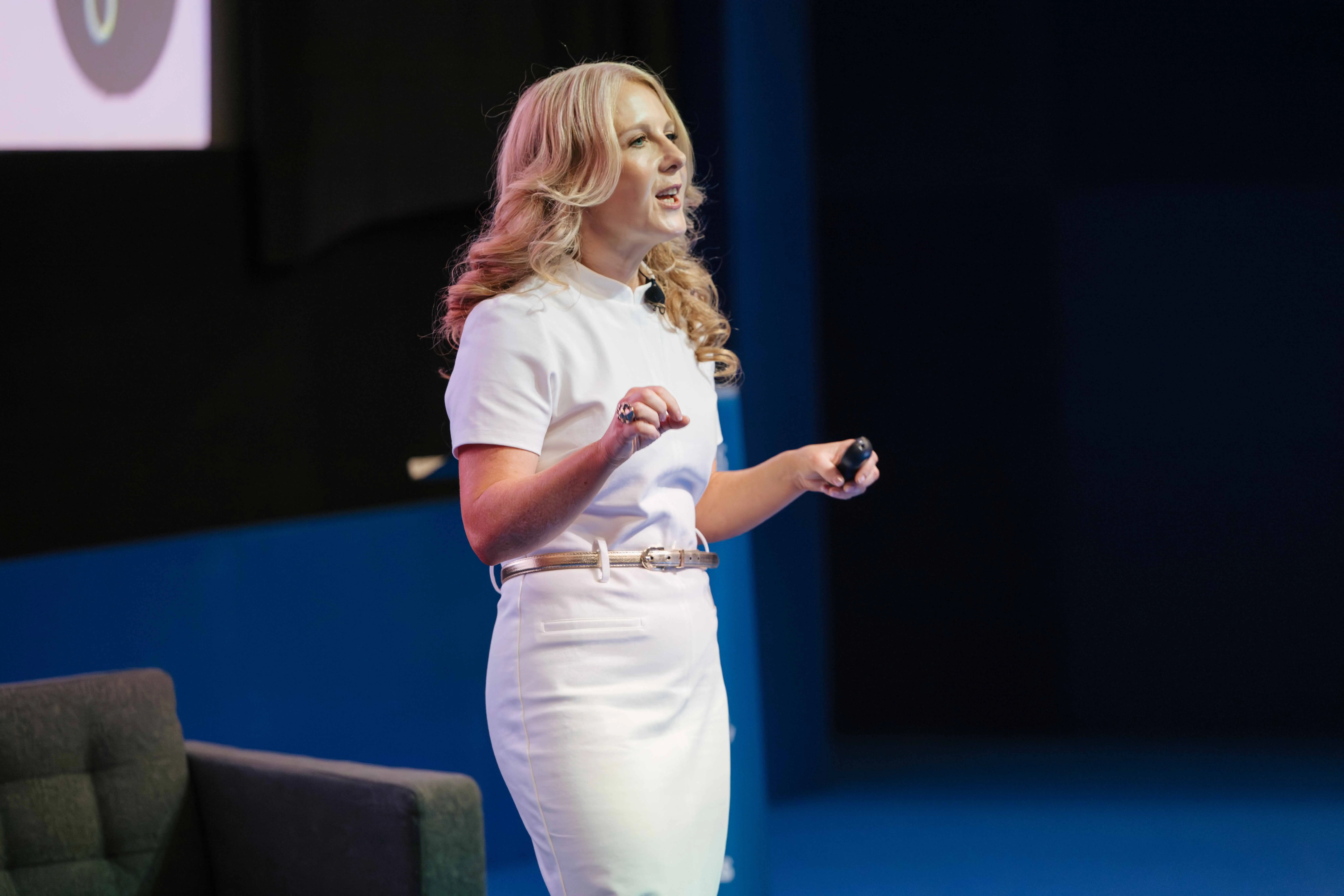 Tracy Gunn speaks on stage.