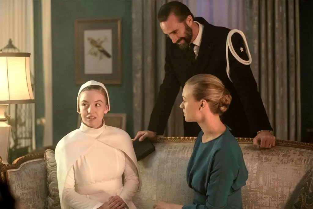 Sydney Sweeney sitting on a couch