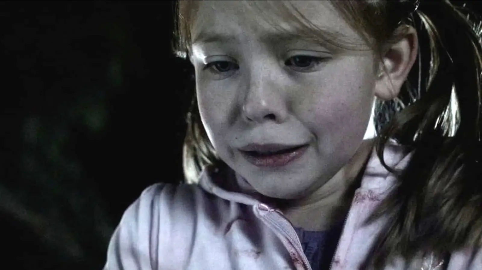 Sydney Sweeney as a young girl crying