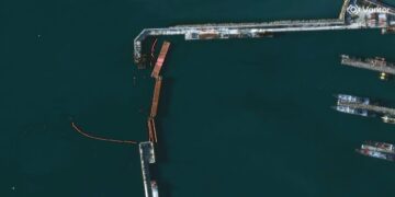 Satellite images show Russia fortified a port against Ukrainian drone boats. One broke through underwater and exploded.