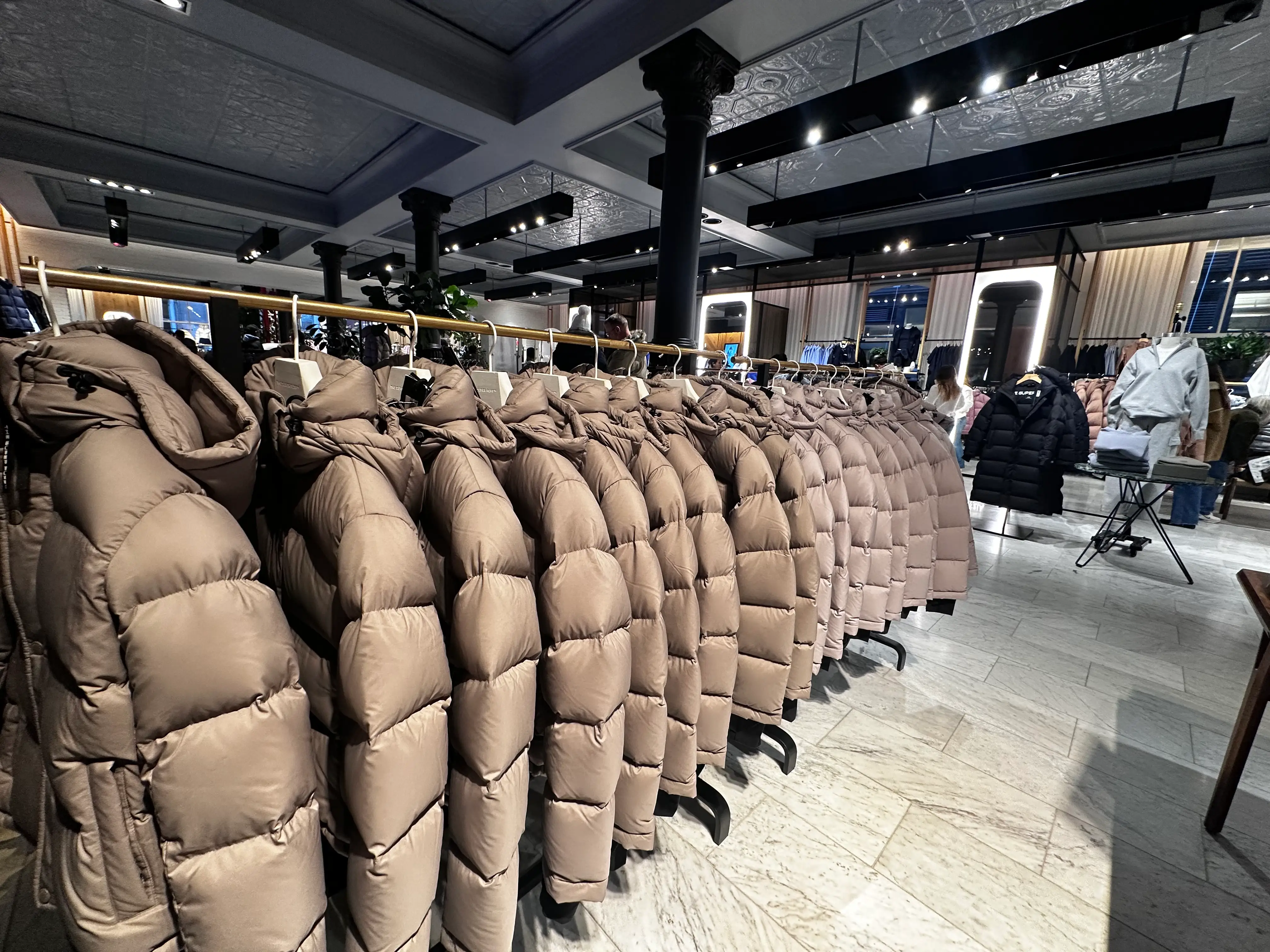 Puffer coats on a rack