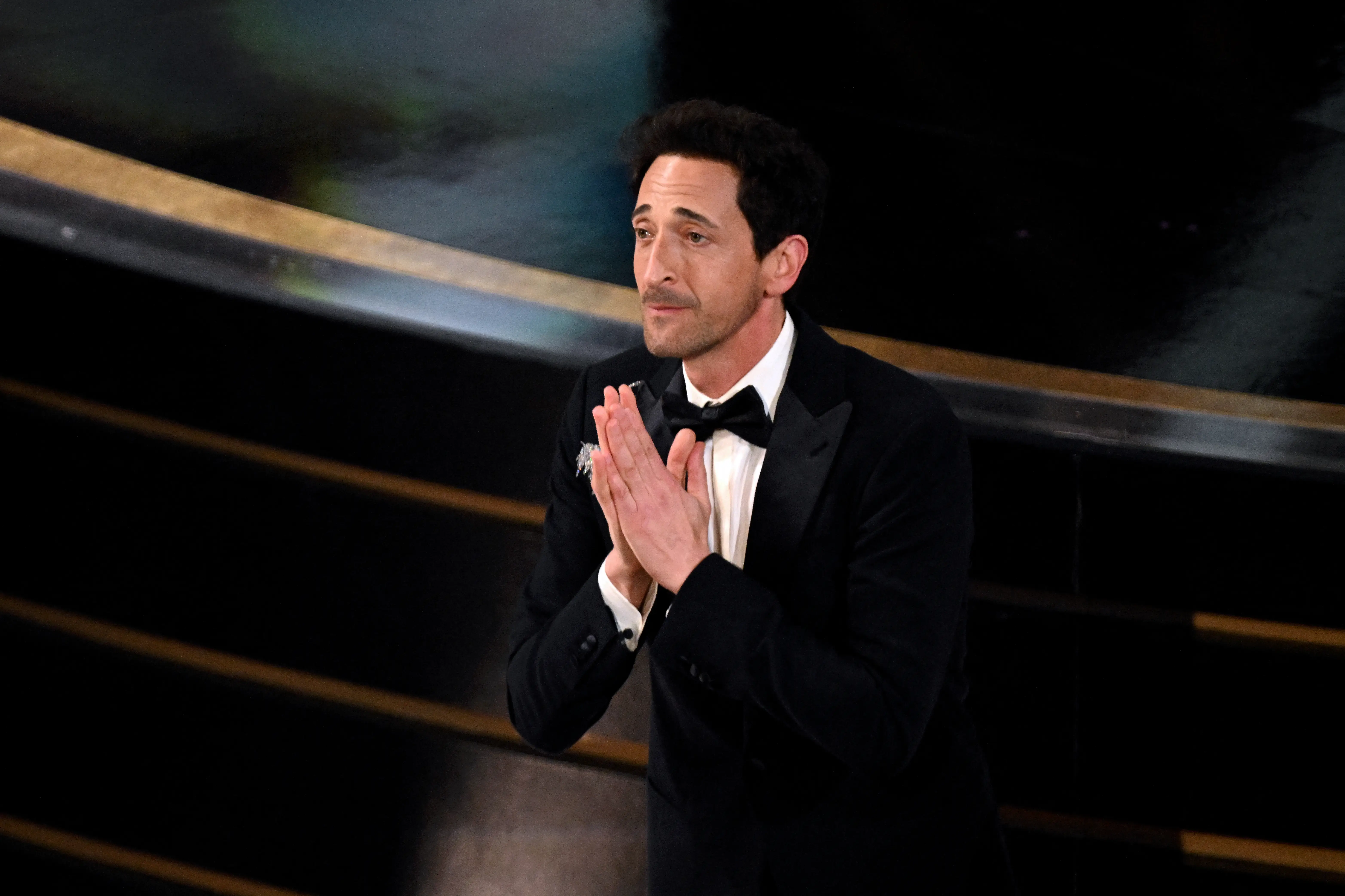 Adrien Brody accepts the award for Best Actor for