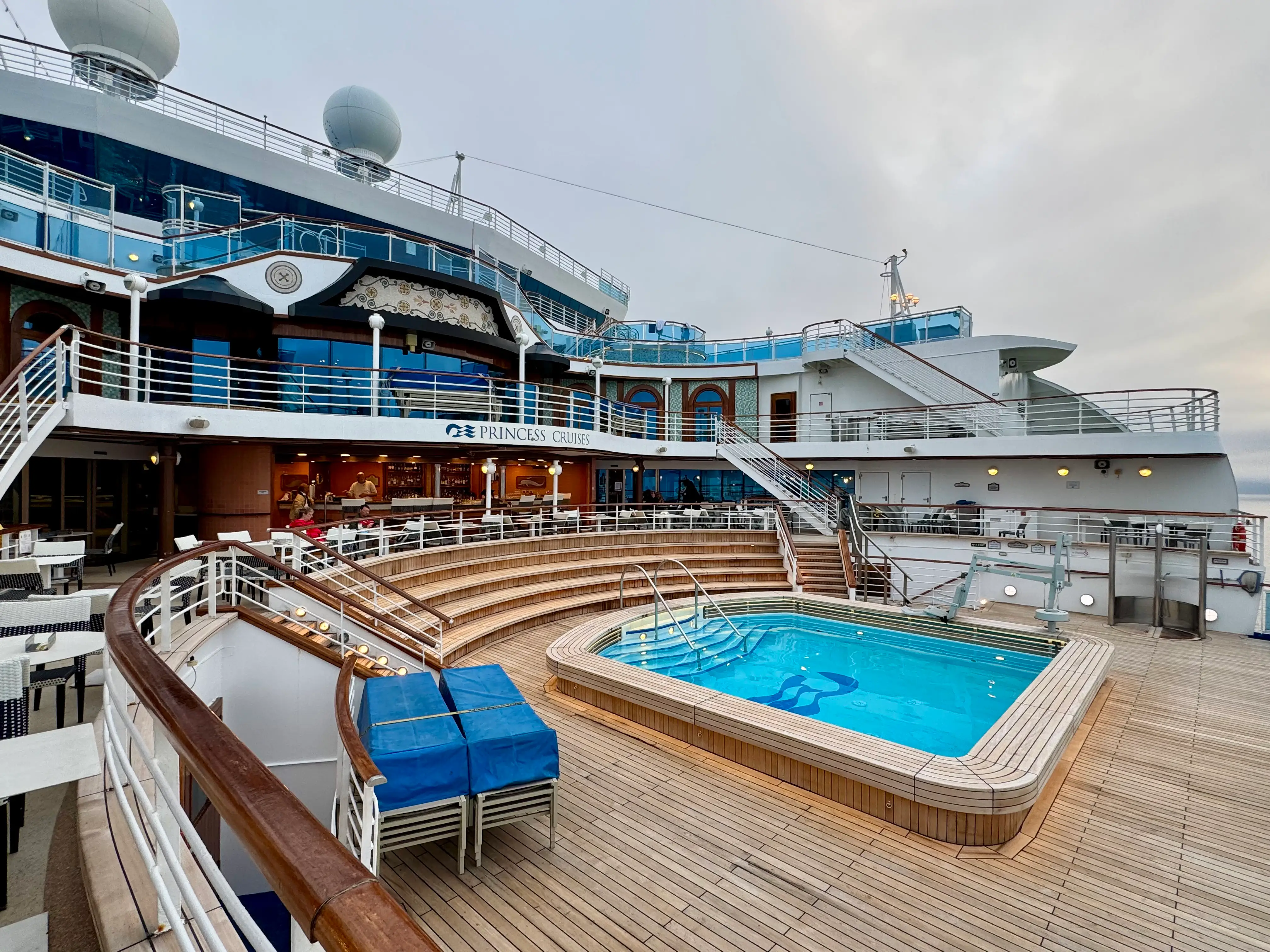 A small pool on the deck of a cruise ship.