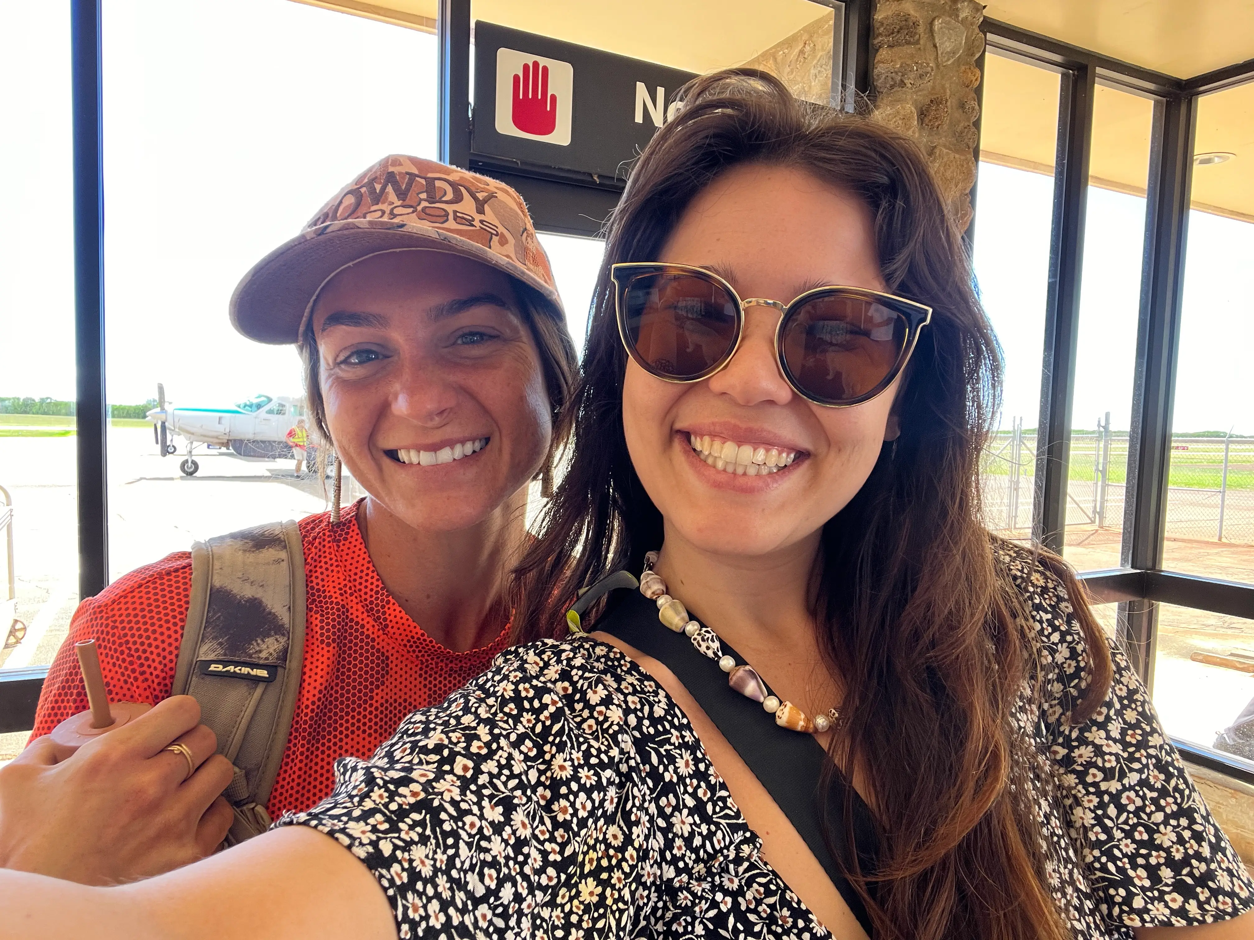 Author Ashley Probst smiling in selfie with friend