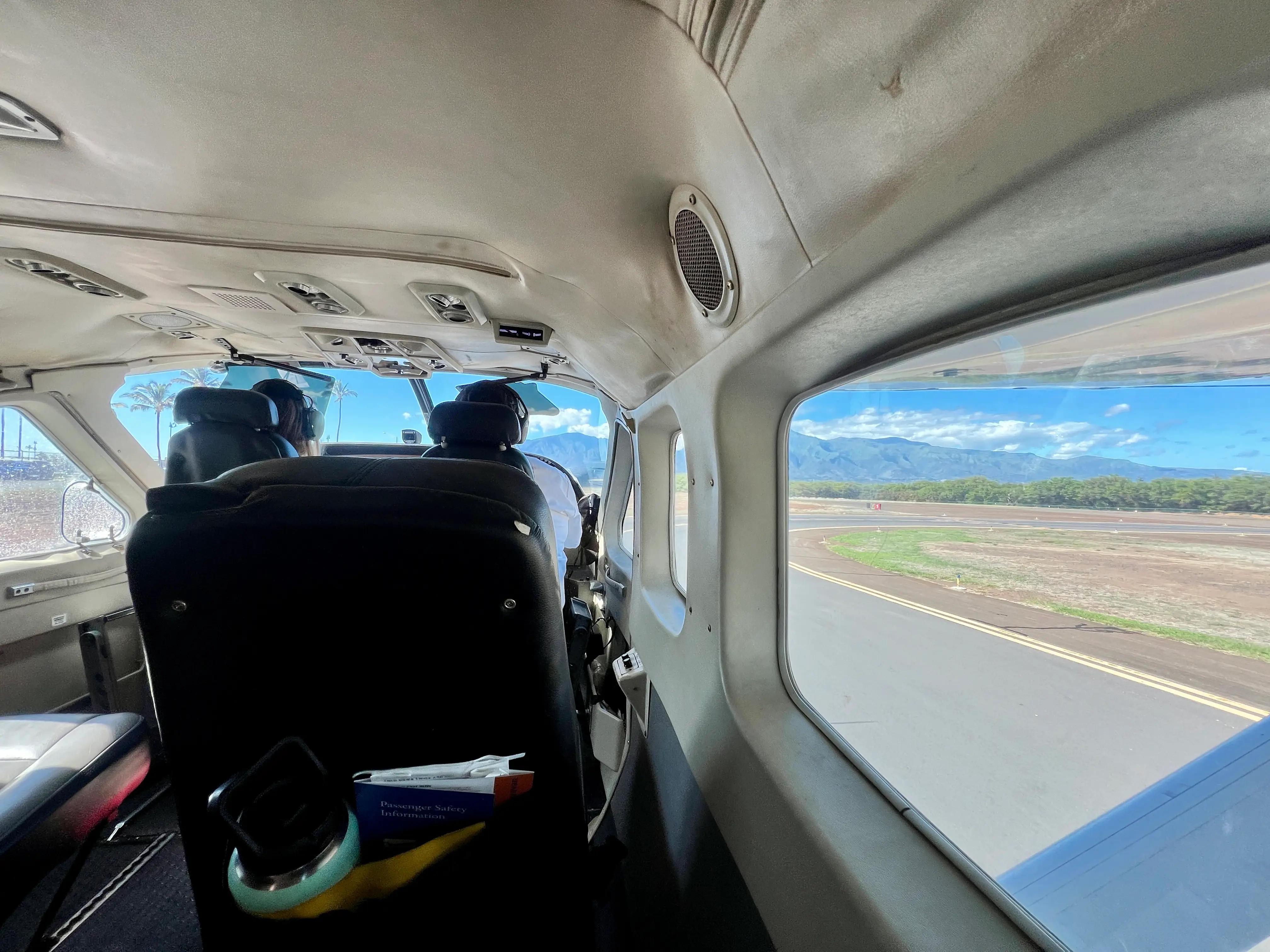 View of land, mountains outside of plane window