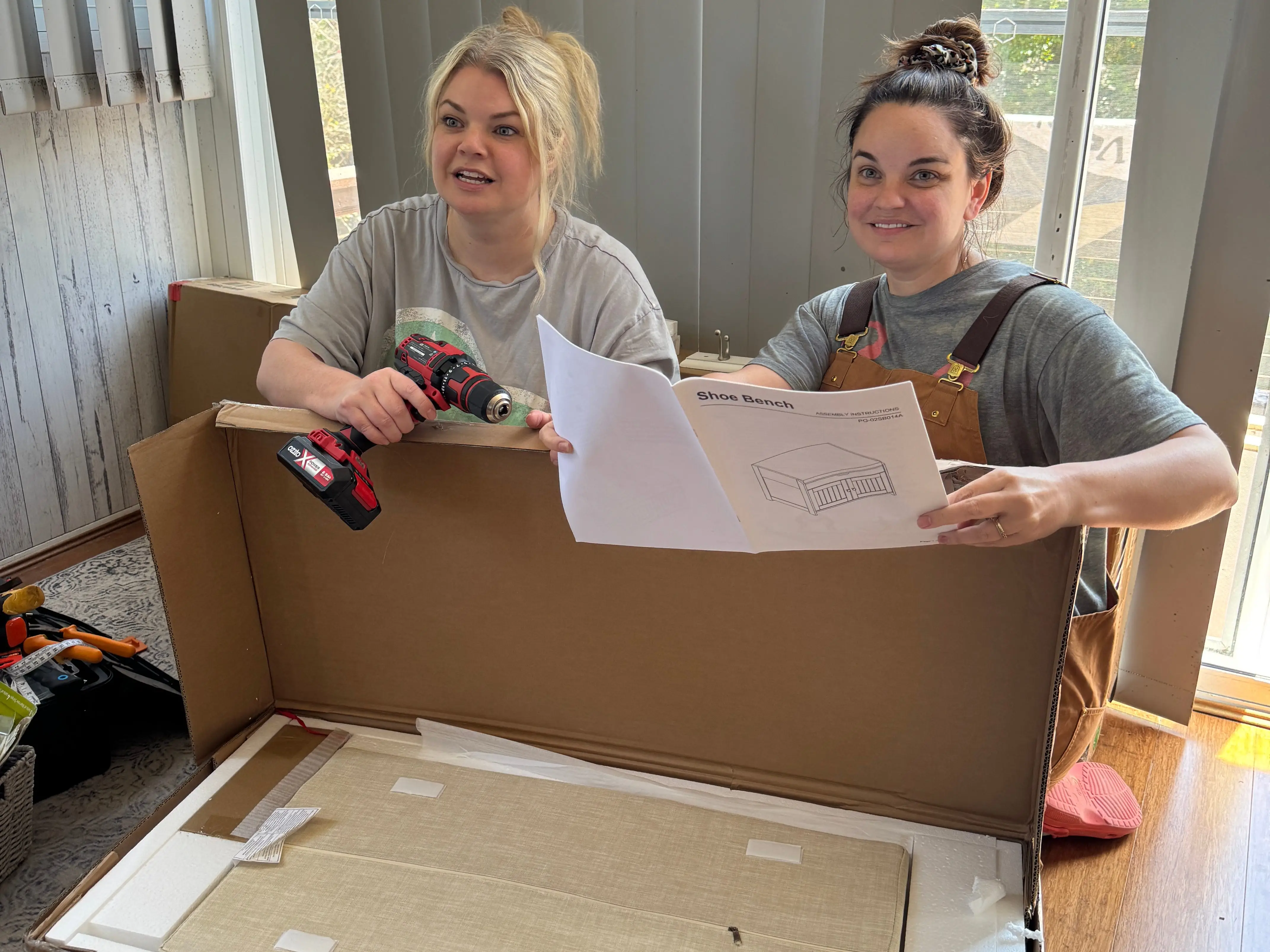 Rachel Reva and her sister building furniture