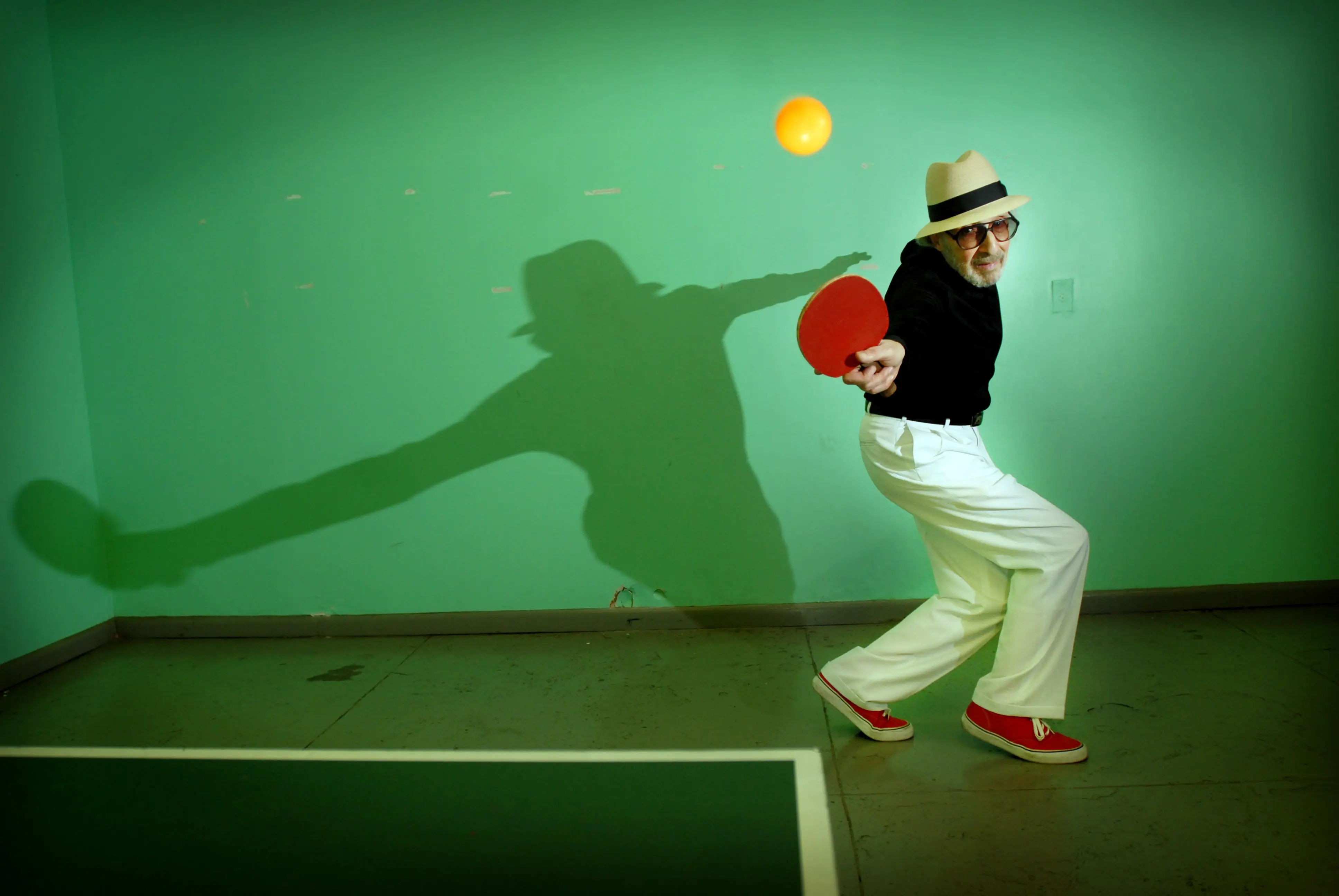 Marty Reisman hitting a ping pong shot