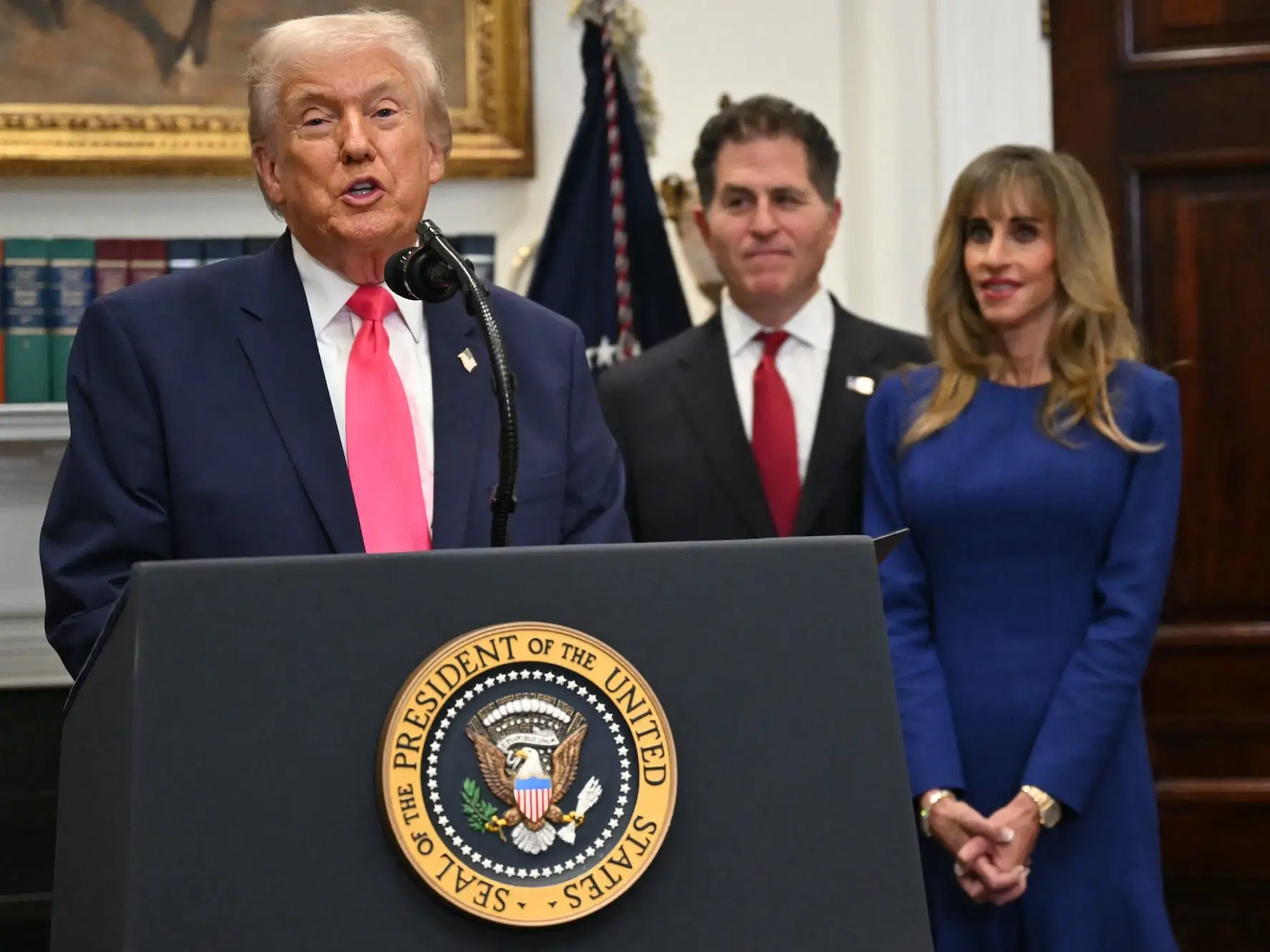 Donald Trump and Michael and Susan Dell