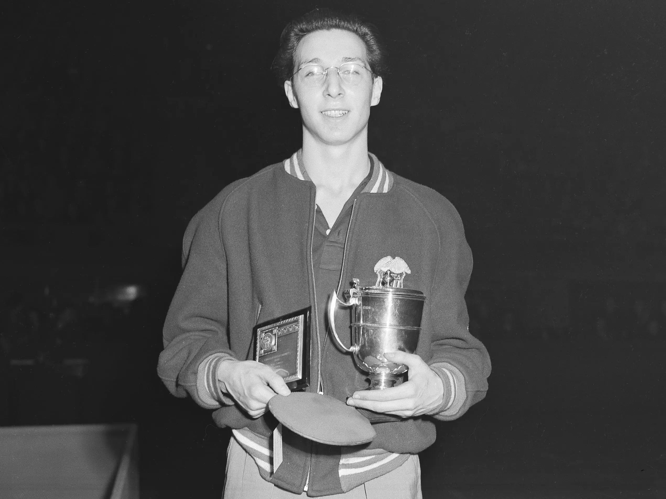 Marty Reisman holding trophey