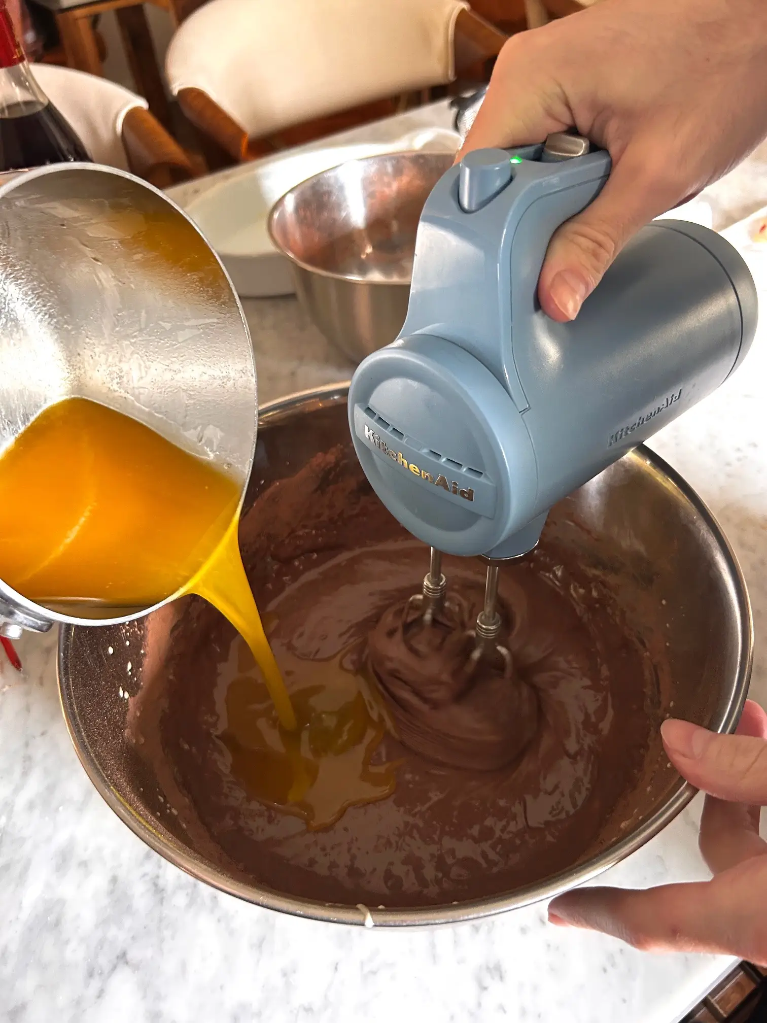 Adding melted butter to batter for Ina Garten's brownie pudding