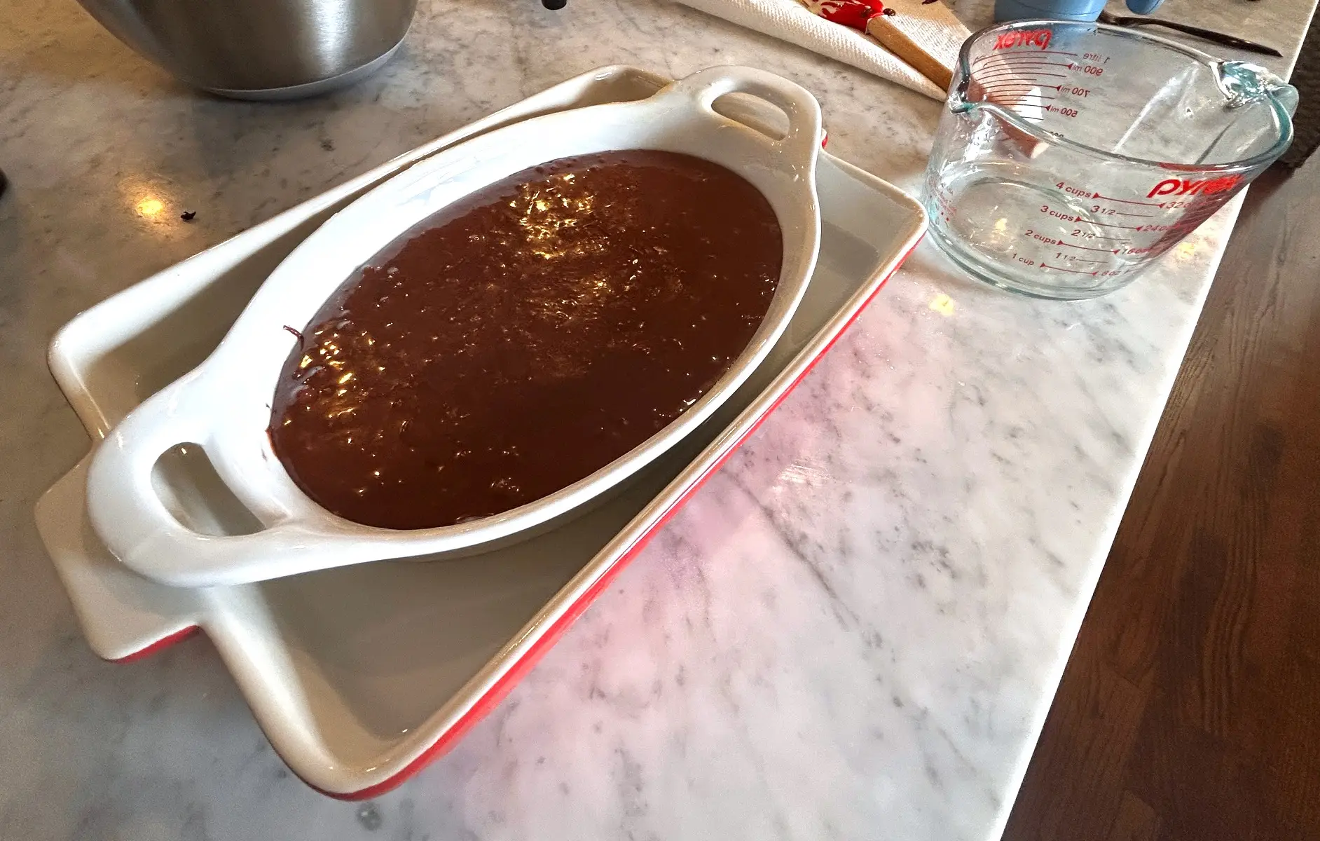 Putting baking pan in hot bath for Ina Garten's brownie pudding