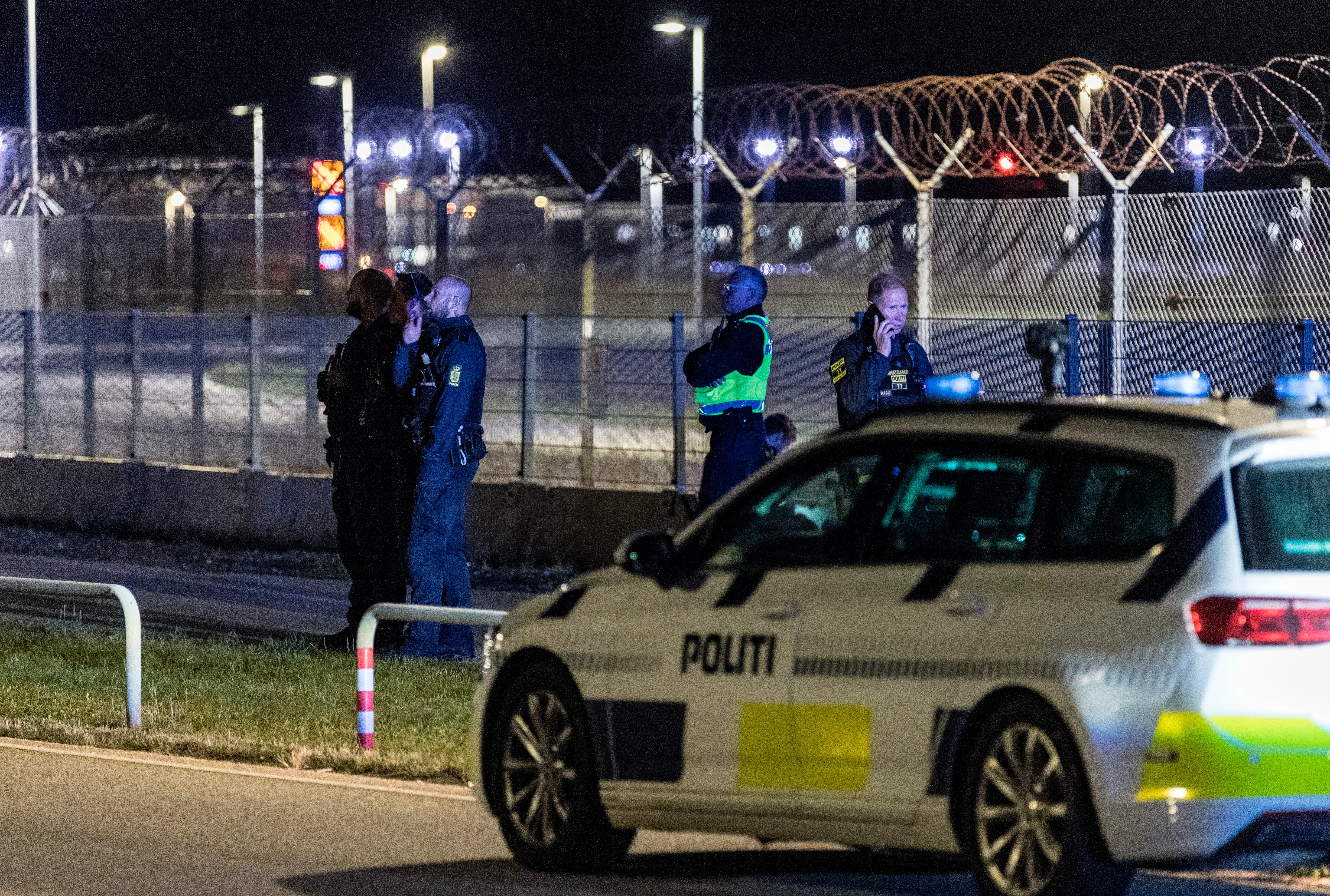 The Danish police are seen at Copenhagen Airport, in Kastrup near Copenhagen, on September 22, 2025.