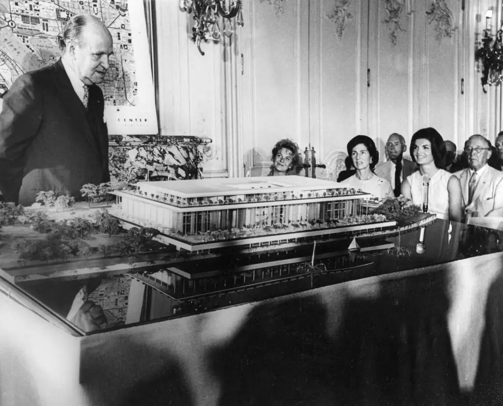 Architect Edward Durell Stone unveils a model of what would become the Kennedy Center.