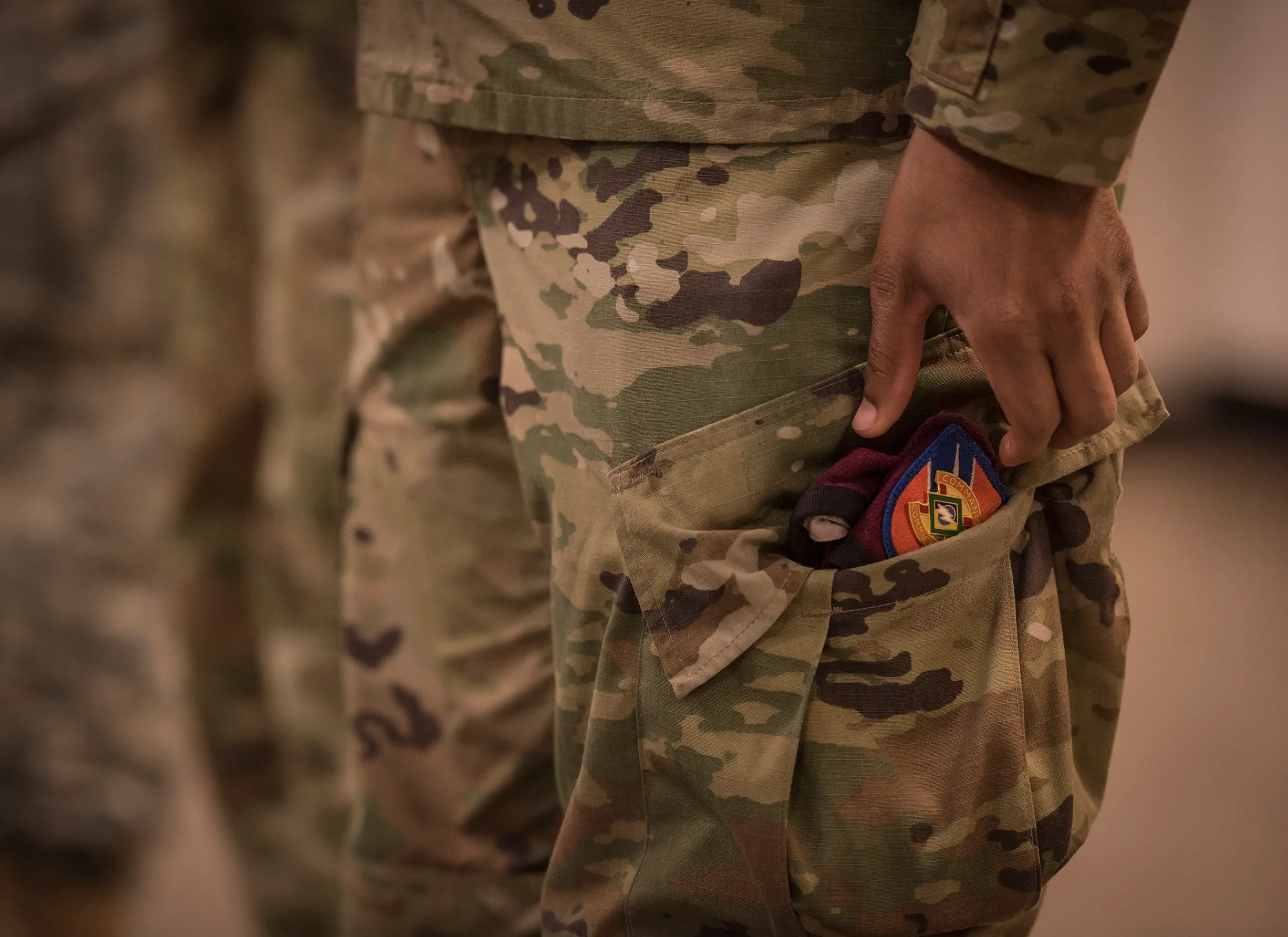 A solider pockets his beret in East Point, Ga., March 7, 2017.
