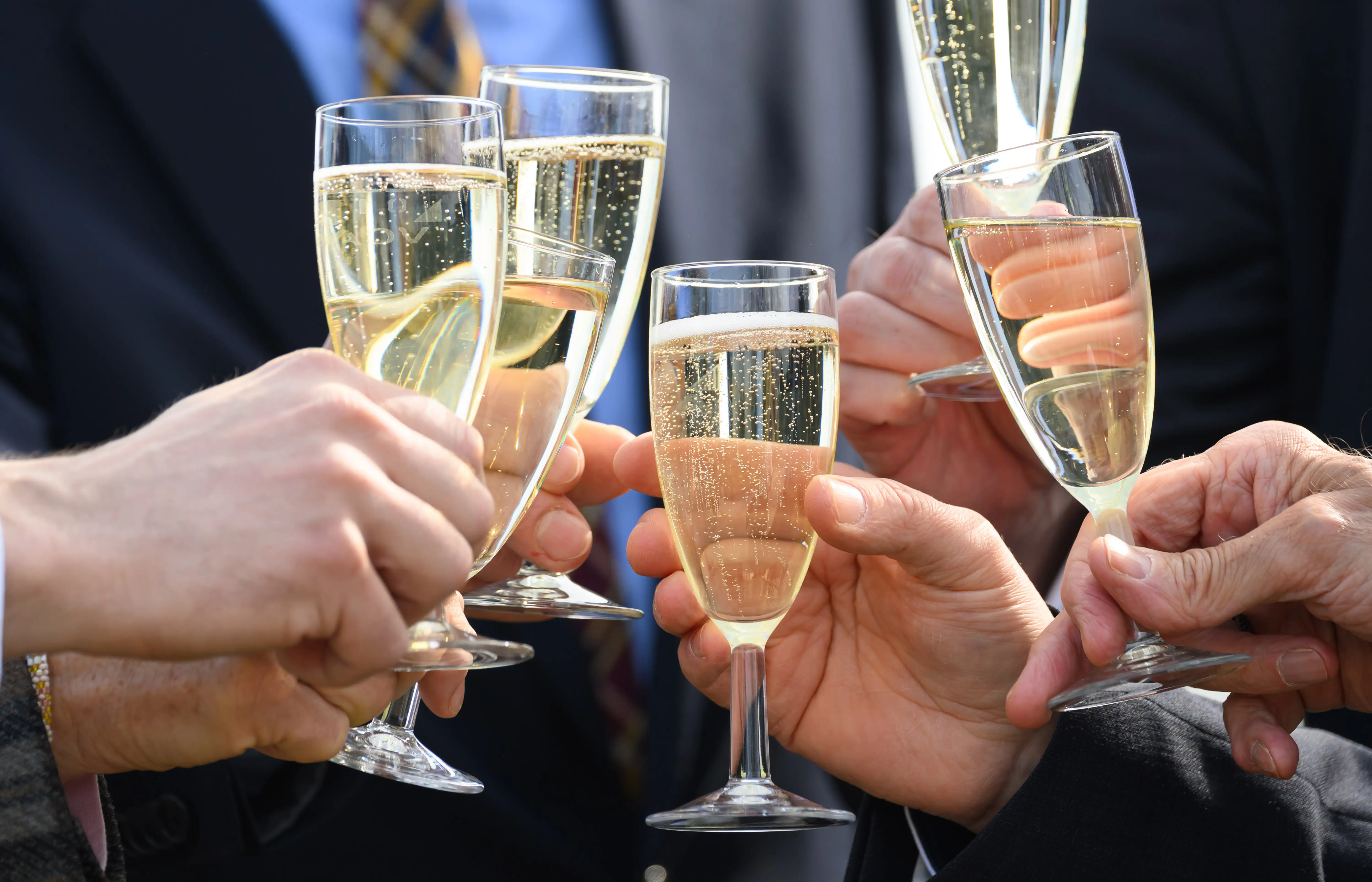 Glasses of Champagne are pictured.