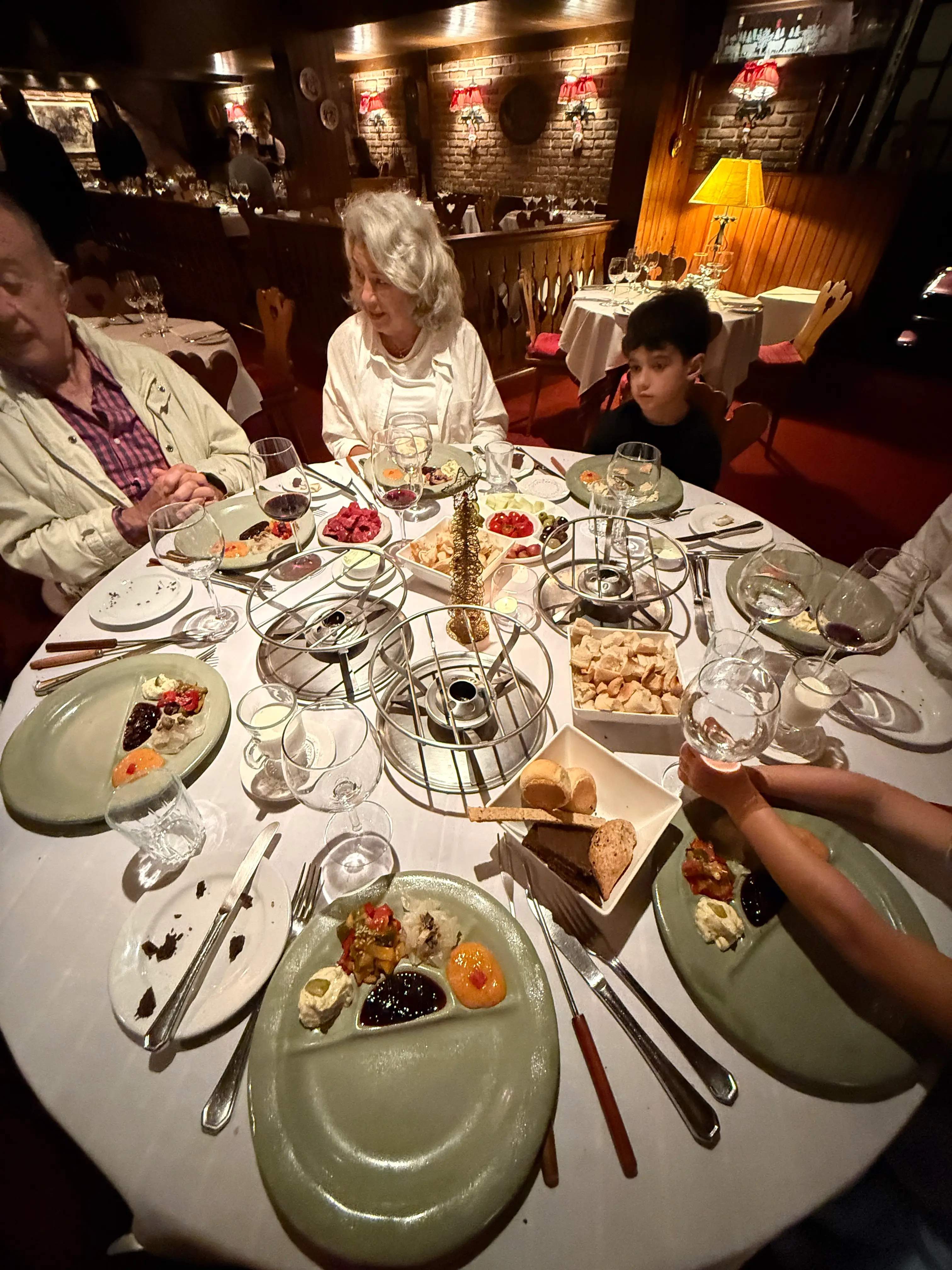 family eating fondue