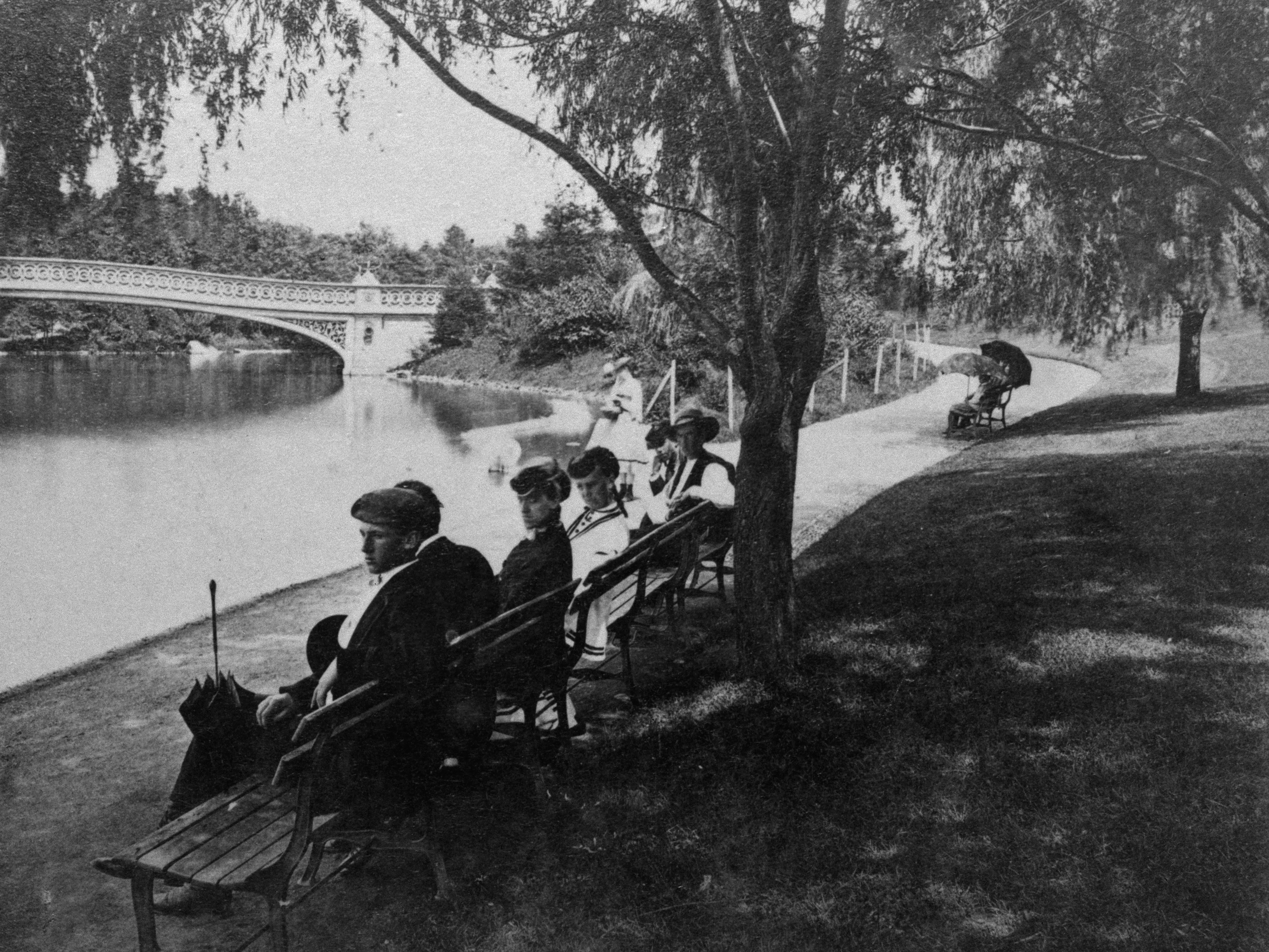 Men sitting in Central Park in the mid-1870s.
