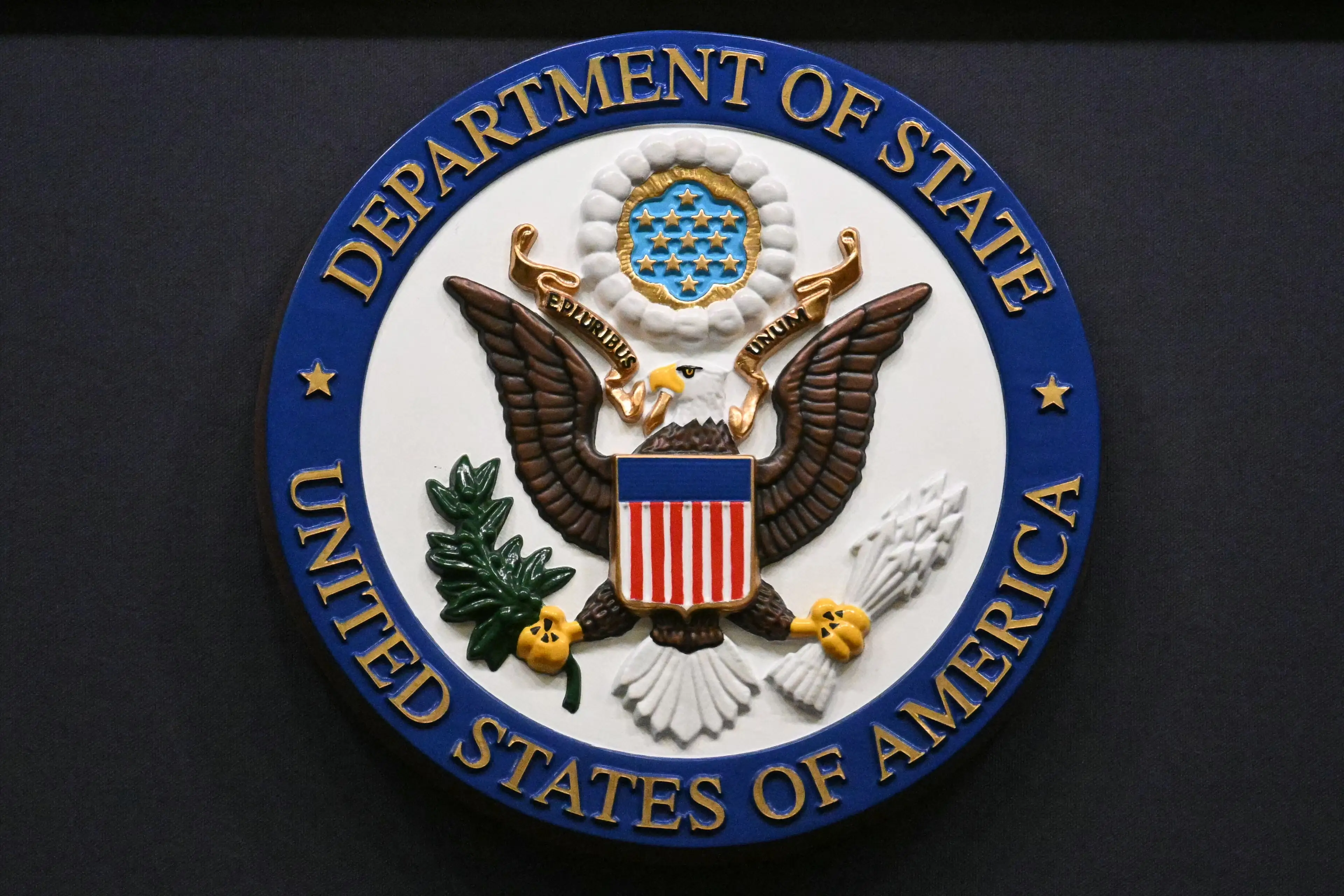 State Department seal.