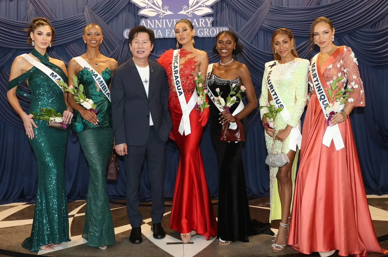 Nawat Itsaragrisil with Miss Universe 2025 contestants.