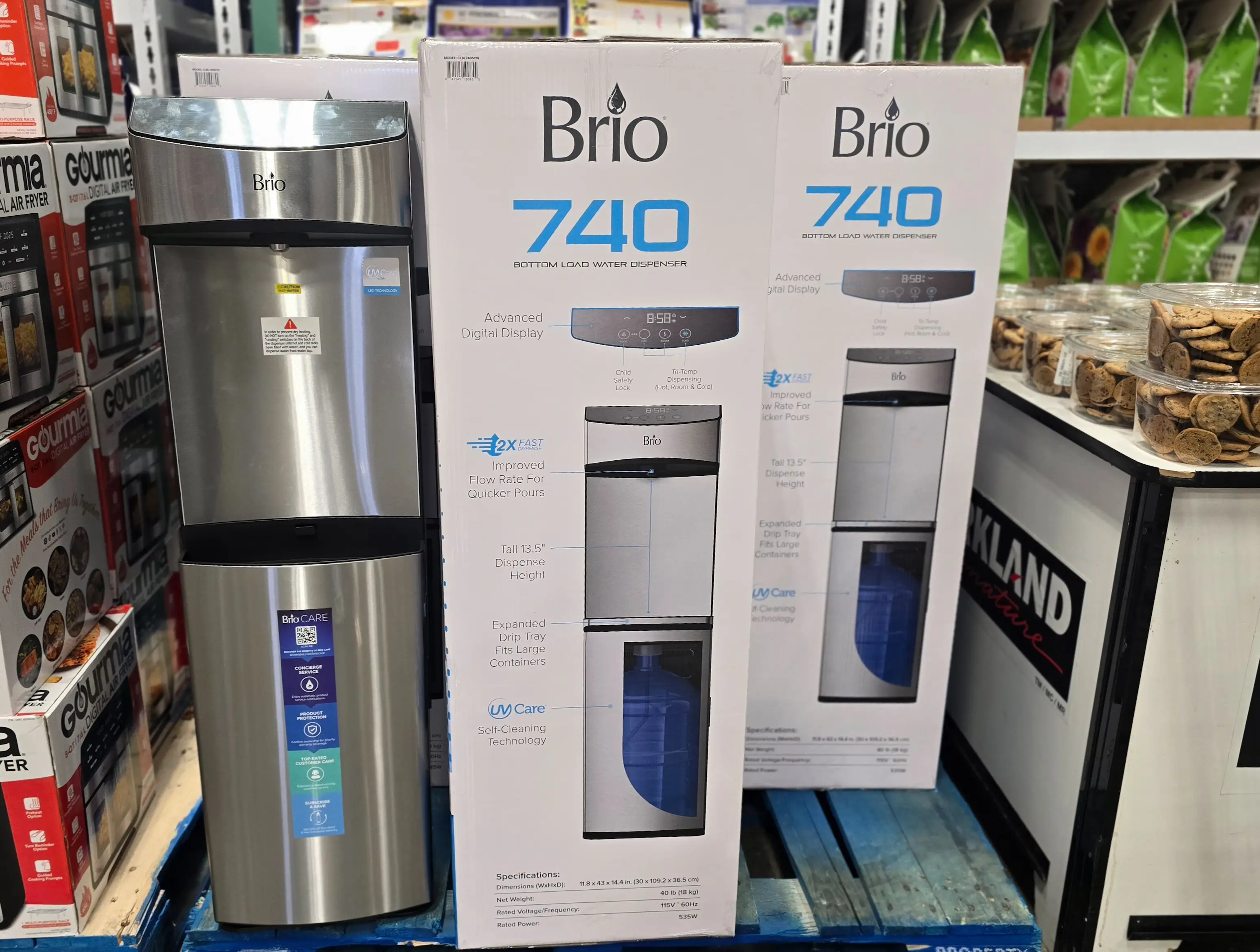 A Brio watercooler next to its box, on display at Costco.