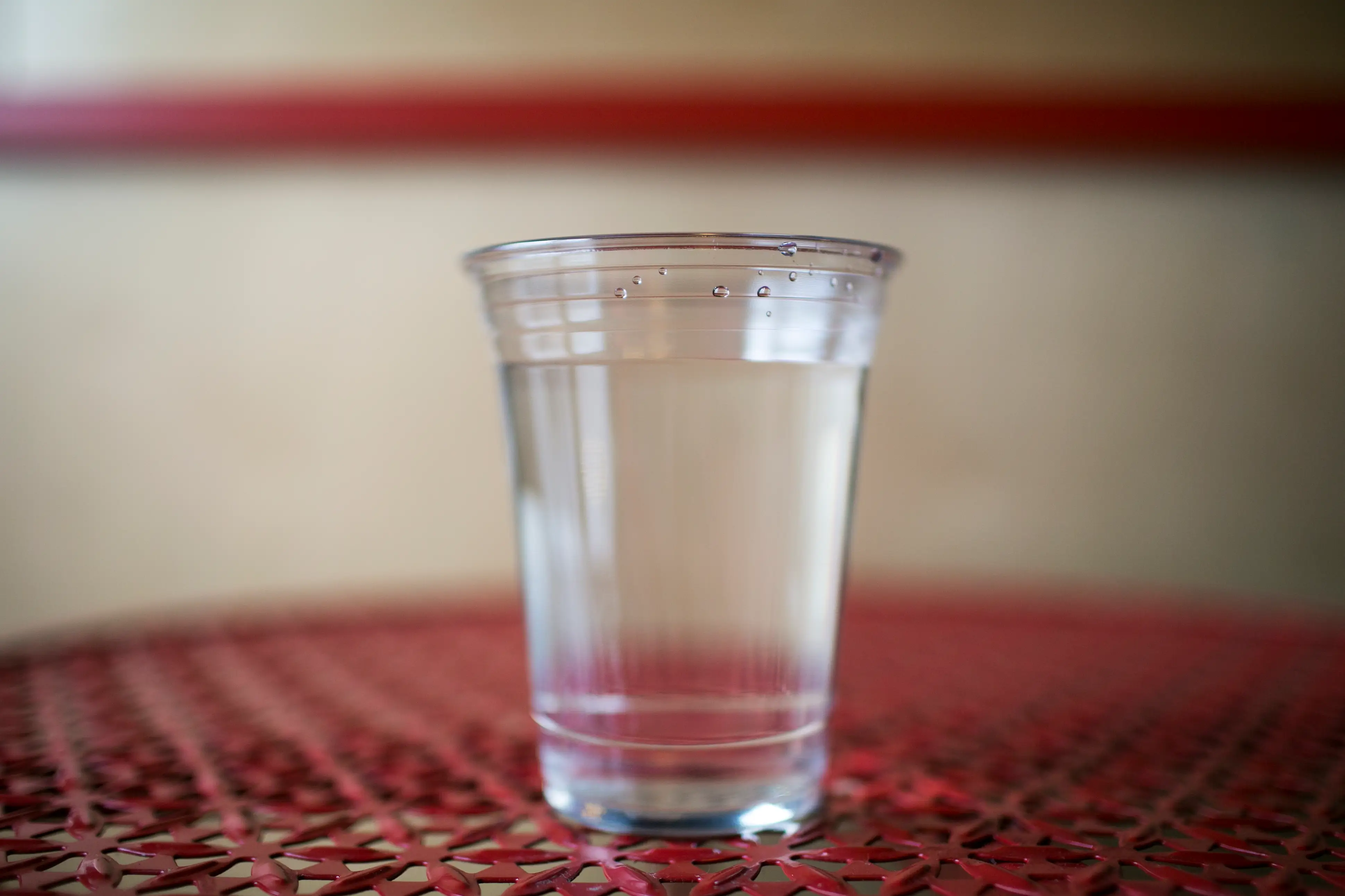 A plastic cup with water