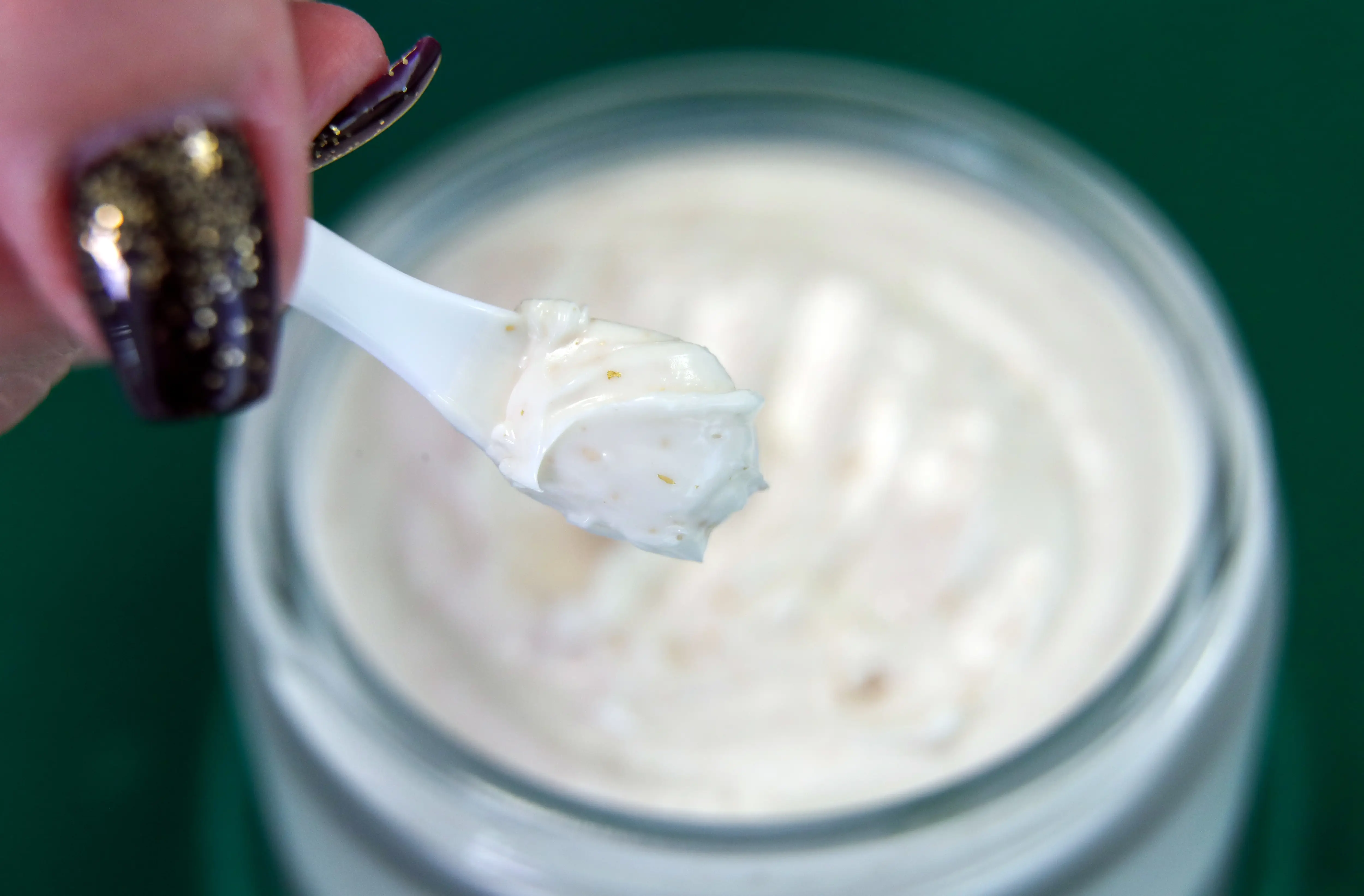 A close-up shot of a thick beauty cream