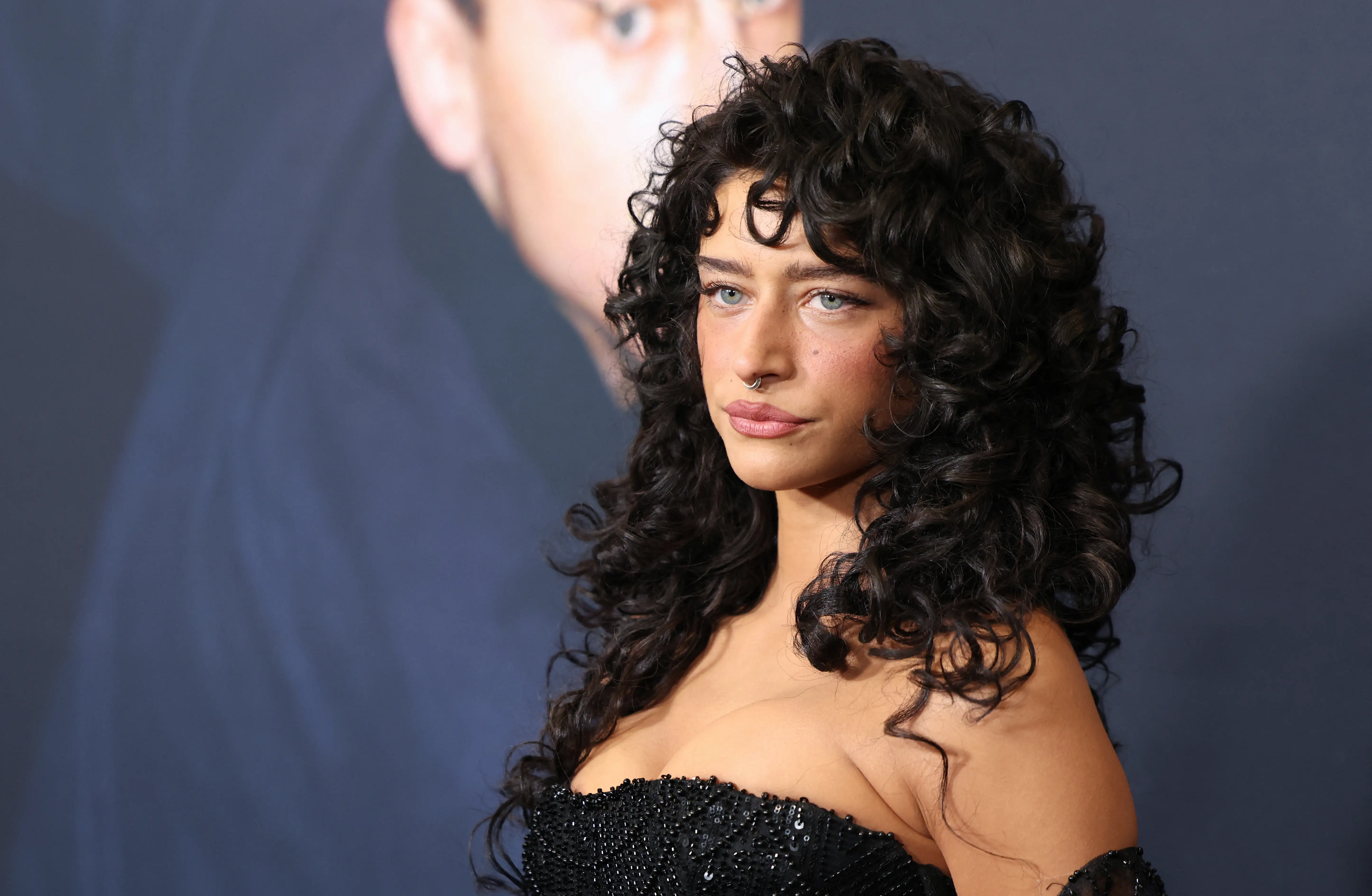 Odessa A'zion in a black dress