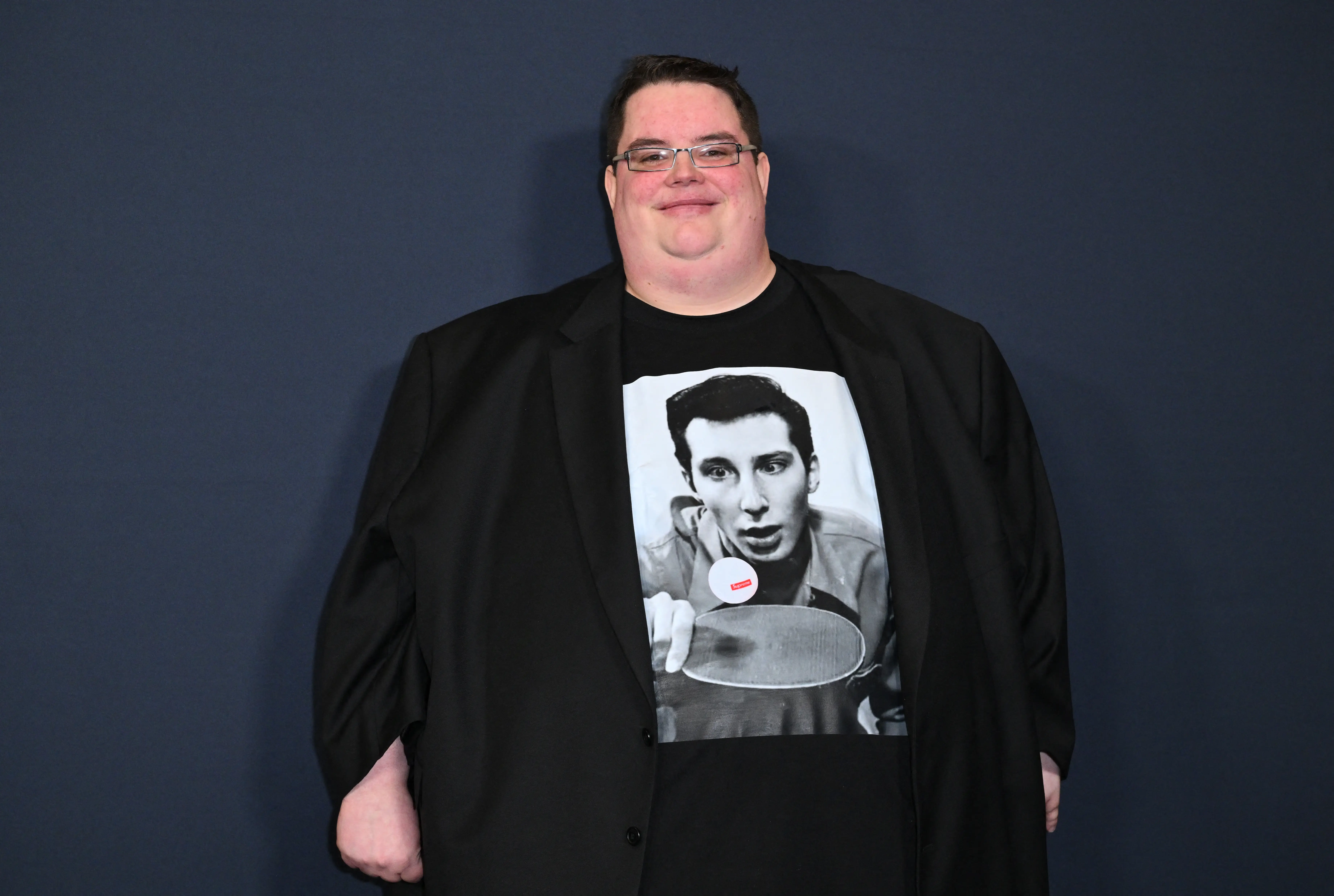 Luke Manley in a black jacket and Marty Reisman shirt