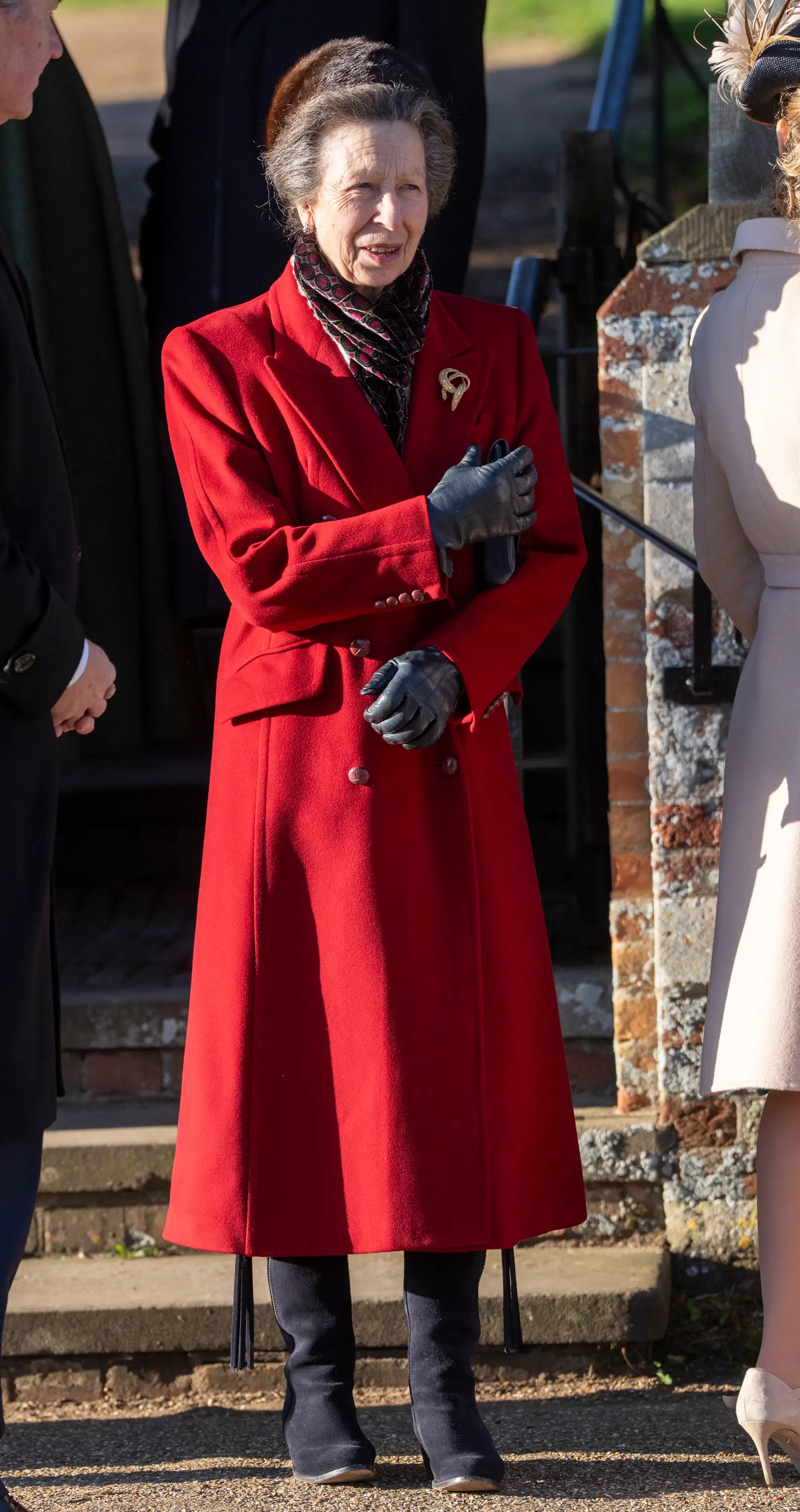 Princess Anne wears a red coat on Christmas Day in 2025.