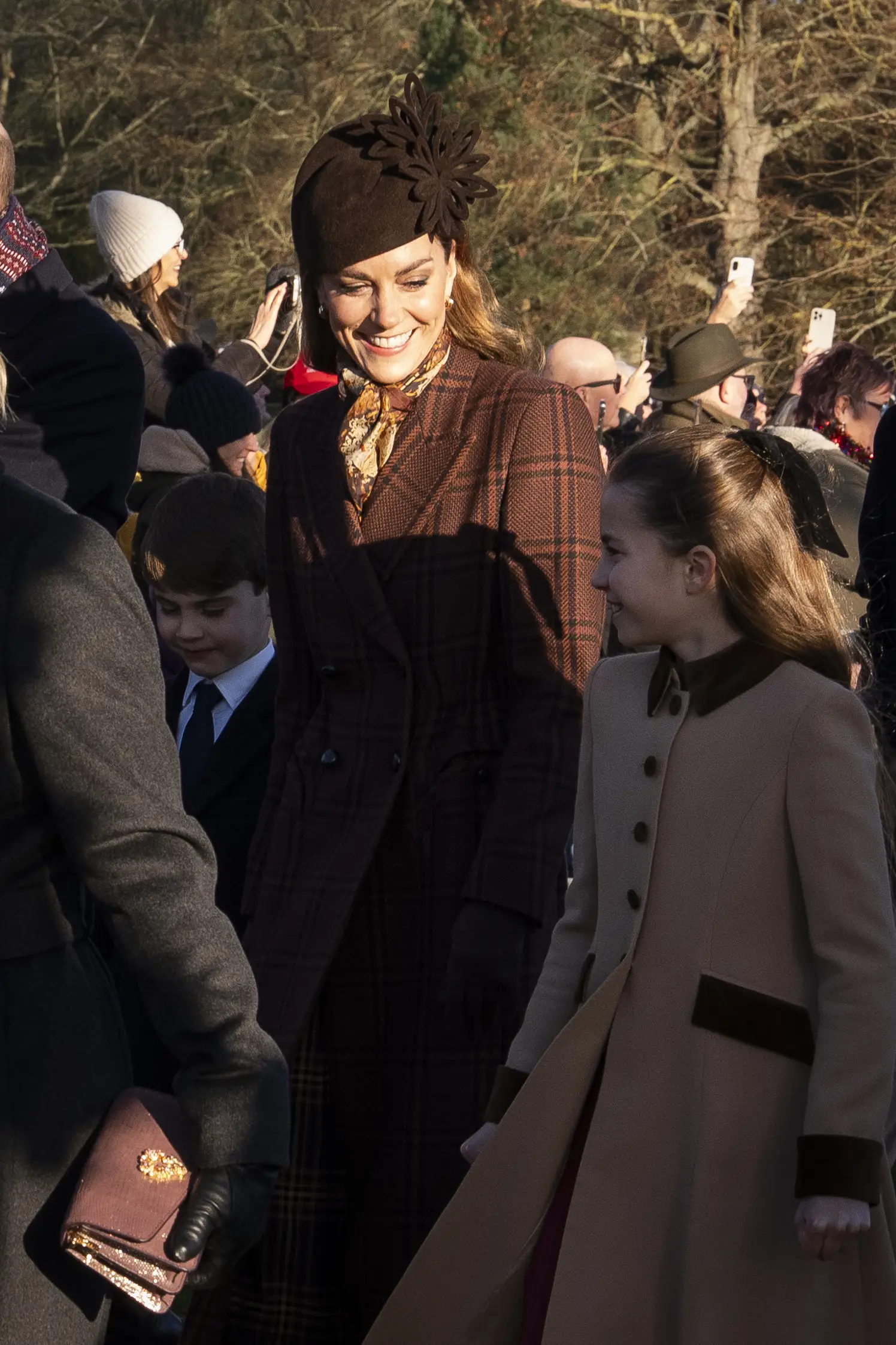 Kate Middleton and Princess Charlotte attend the royal family's annual Christmas walk at Sandringham in December 2025.