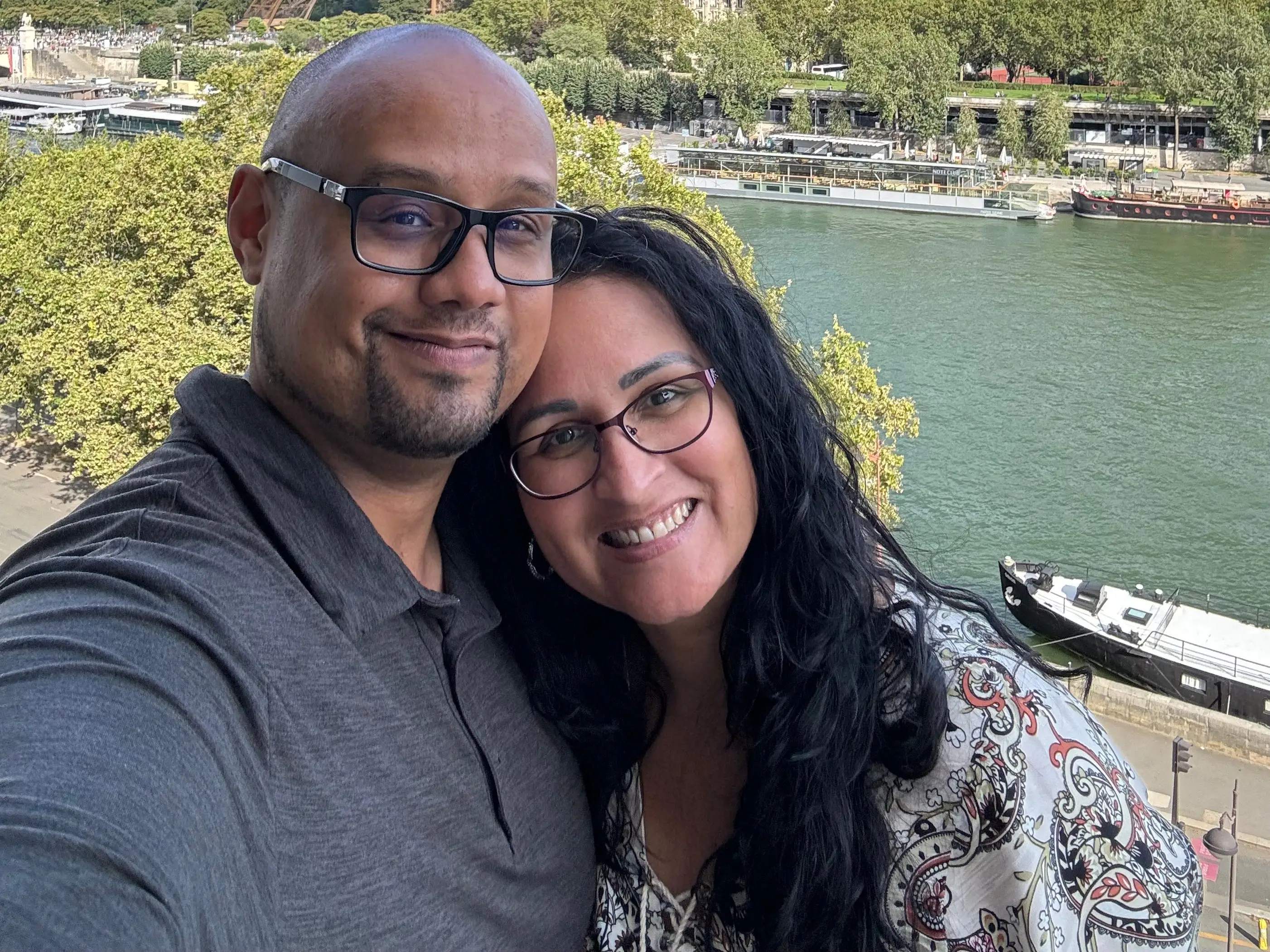 Kimanzi Constable and wife in front of the wiffel tower