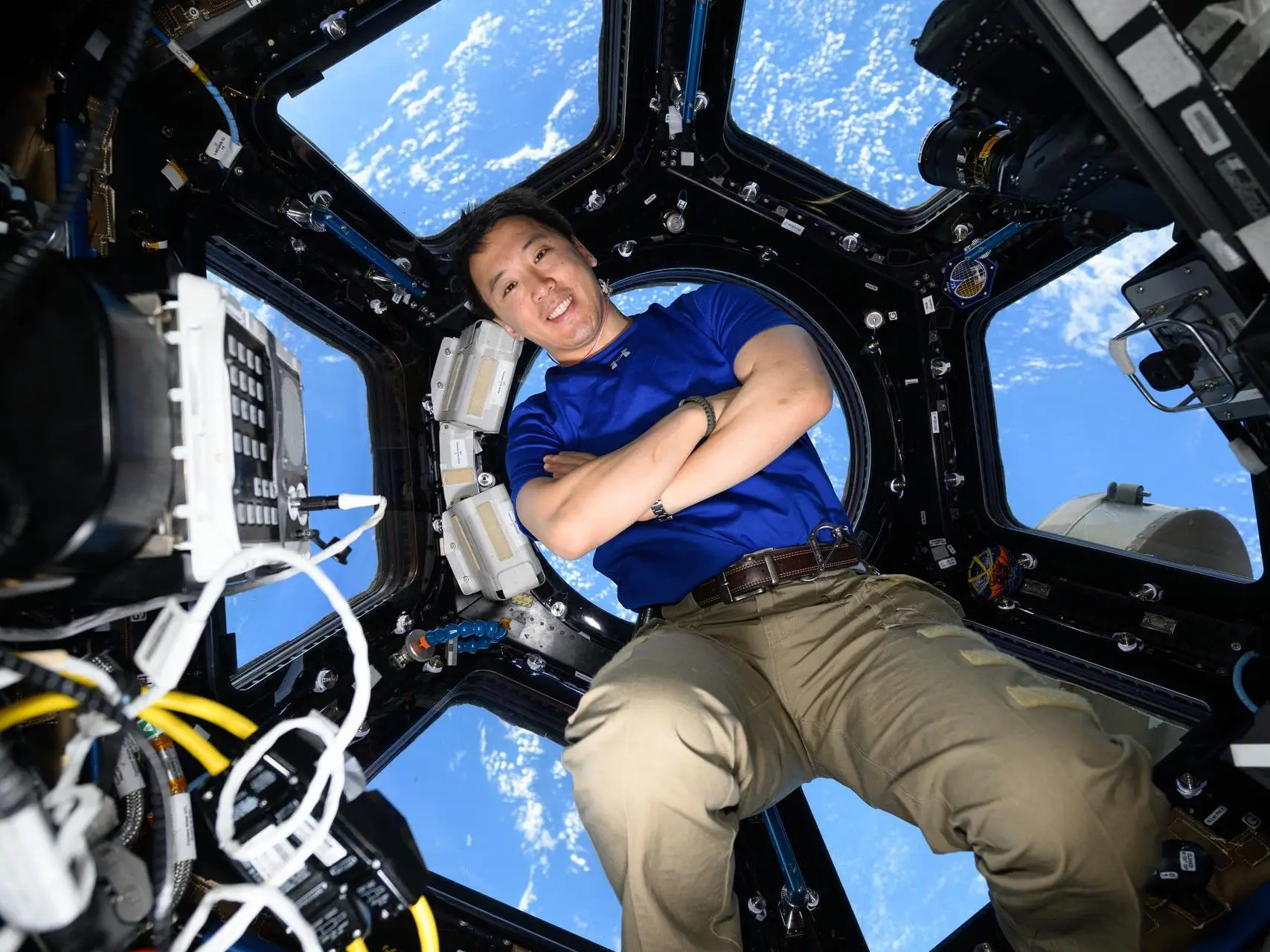 NASA astronaut Jonny Kim poses for a portrait inside the International Space Station's 