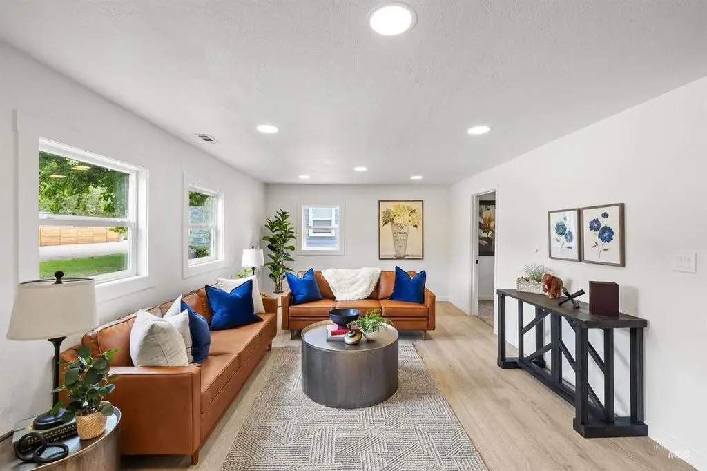A living room with furniture and decor.